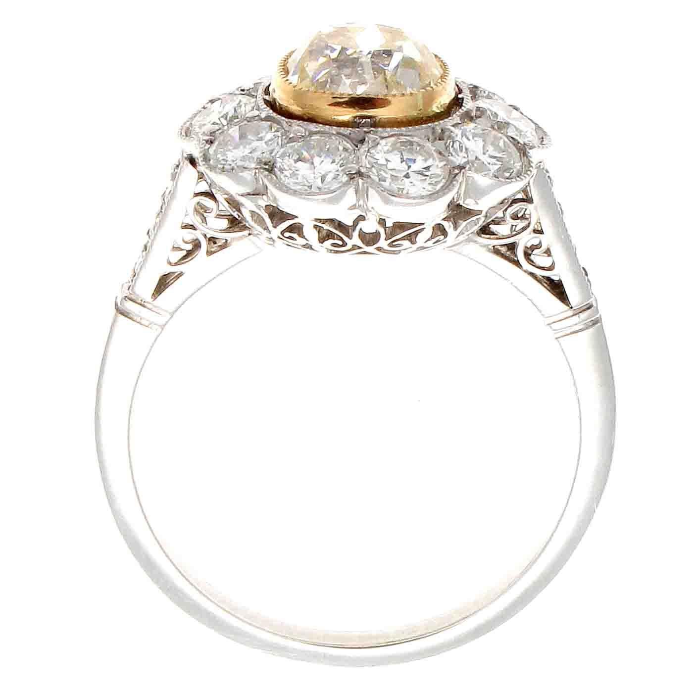 yellow diamond cluster engagement ring