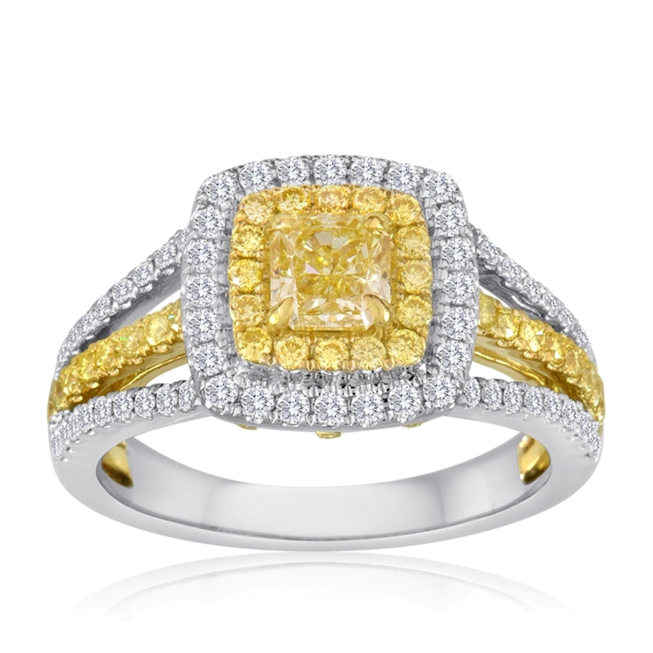  Fancy Yellow Diamond Radiant Cut 0.70 Carat Encircled in Double Halo of Fancy Yellow Round Diamonds 0.40 Carat and White Round Diamonds 0.43 Carat in a Stunning Three Row Split Shank 18K White and Yellow Gold Ring.

Style available in different
