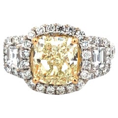 Anello con diamante giallo 1,50ct Y2,91ct 18kwg GIA