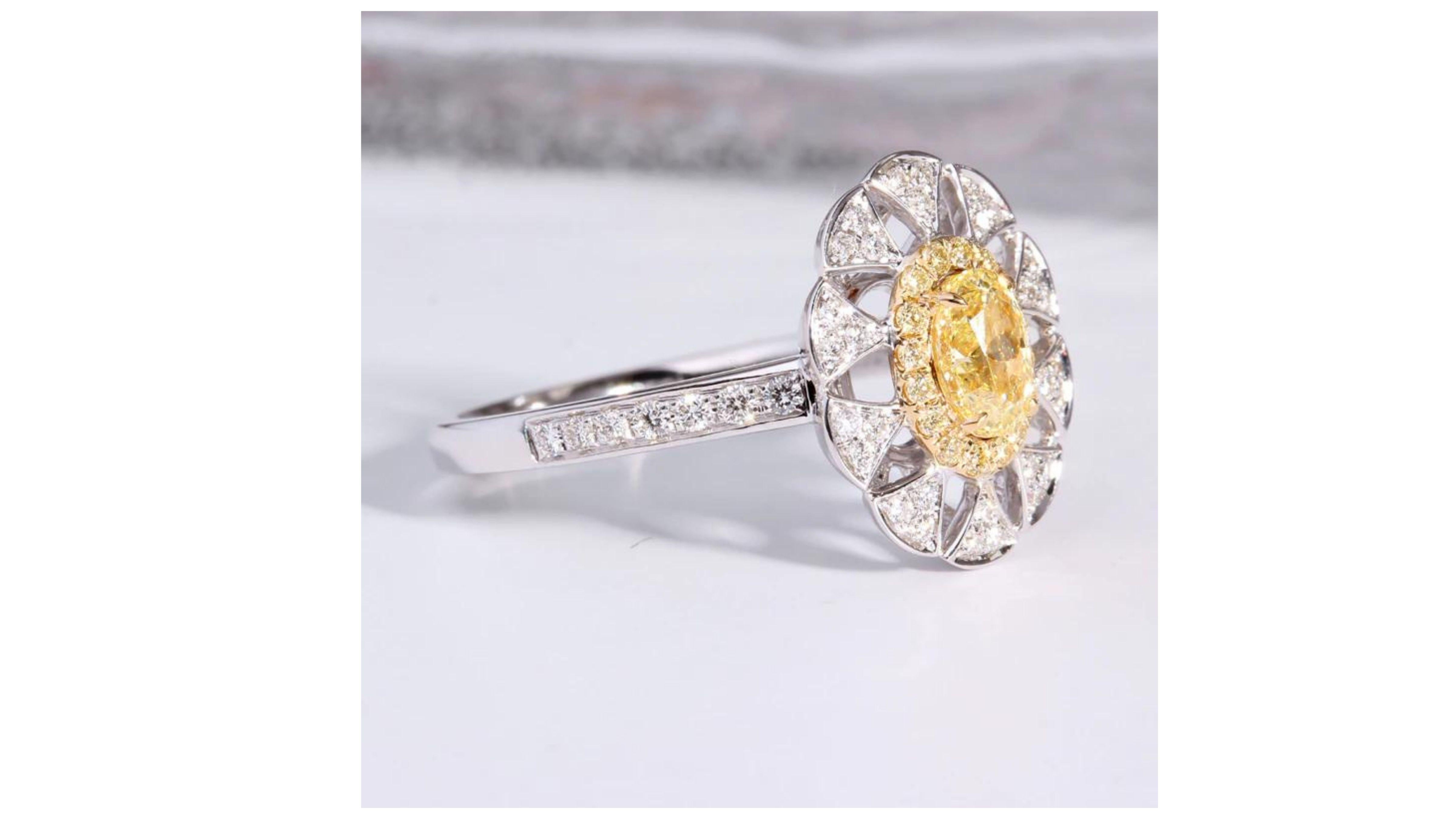 Contemporary Fancy Yellow Diamond Ring 18 Karat White Gold For Sale