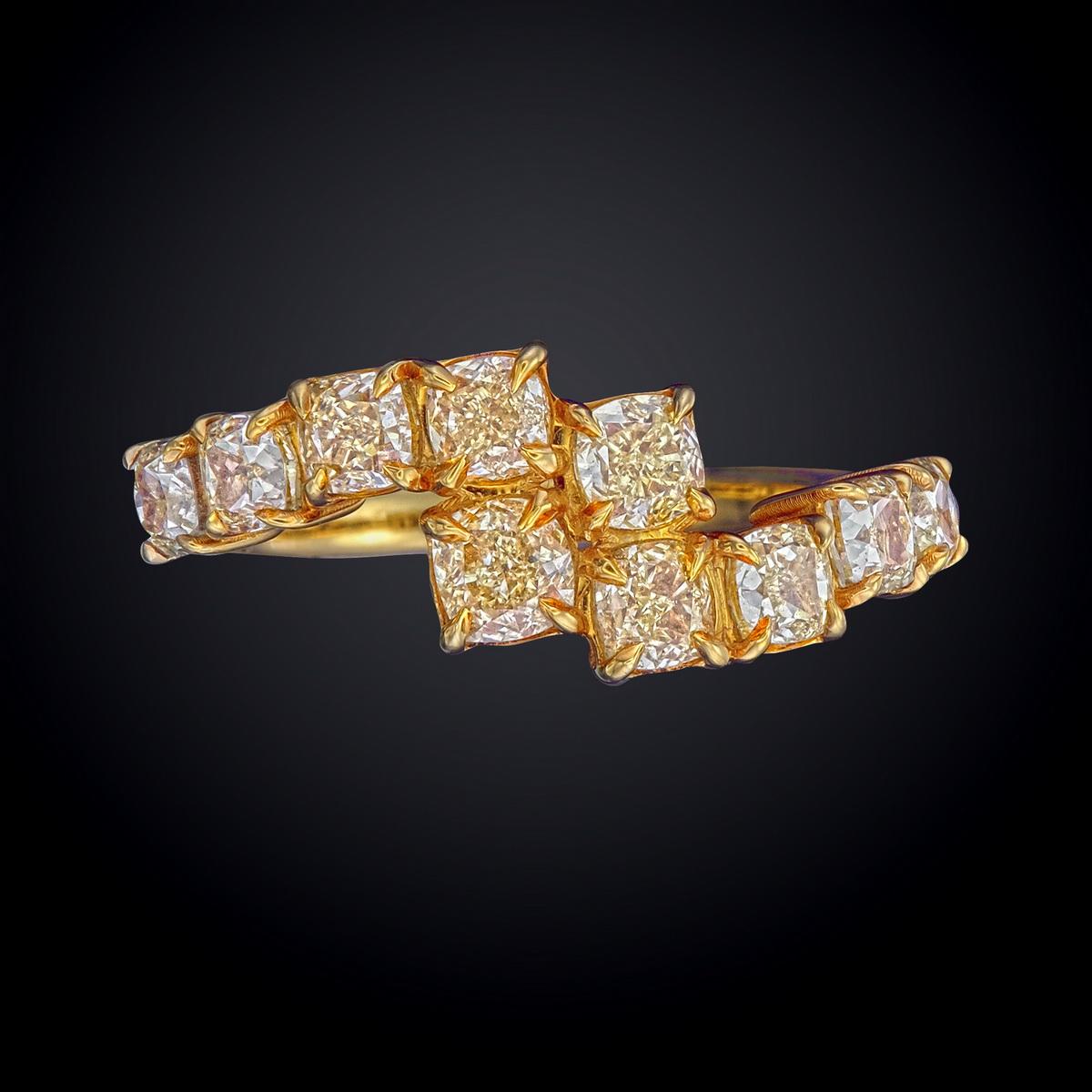 18kt white gold ring with diamonds
  
  Gold colour & karat: White gold 18kt
  Weight: 4.095 grams
  
  Set with-
  Stone type: Diamond
  Shape: Cushion
  Carat: 2.38 (10 Pcs )
  Colour: Fancy Yellow
  Clarity: VVS - VS
