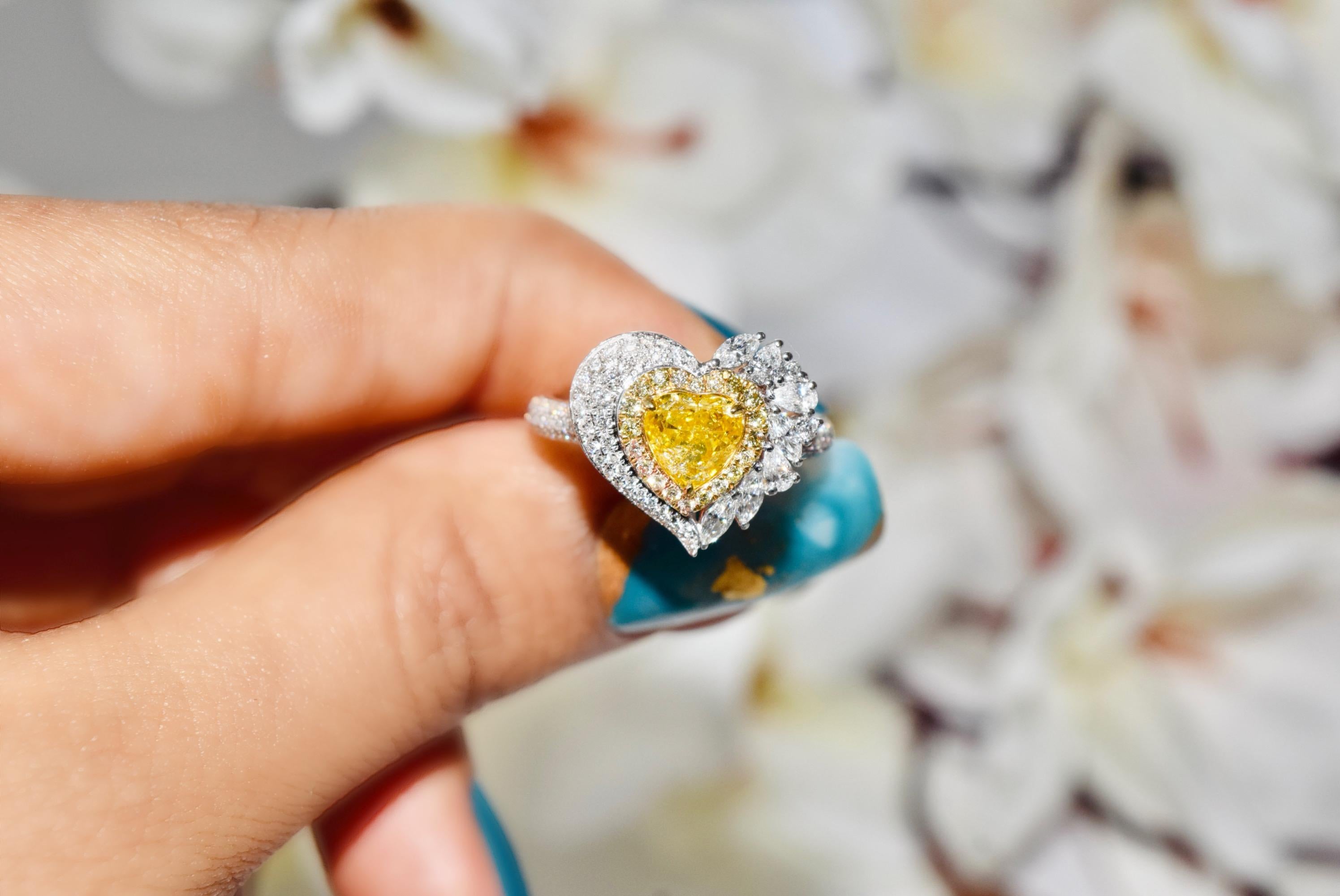 **100% NATURAL FANCY COLOUR DIAMOND JEWELLERIES**

✪ Jewelry Details ✪

♦ MAIN STONE DETAILS

➛ Stone Shape: Heart
➛ Stone Color: Fancy yellow
➛ Stone Weight: 1.02 carats
➛ AGL certified

♦ SIDE STONE DETAILS

➛ Side White diamond -99 pcs- 0.356
