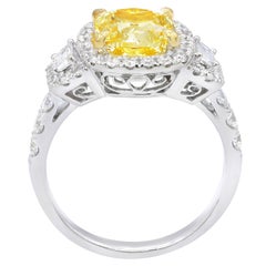Fancy Yellow Diamond Ring Set in Halo Settings with Trapezoids