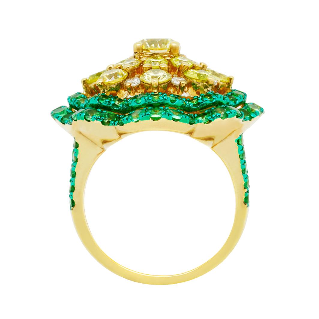 This elegant, one-of-a-kind cocktail ring from 'The Chloris' Yard Collection' by Austy Lee features Tsavorites and Fancy Color Diamonds with the setting of green-colored plated 18K Yellow Gold. This timeless piece is suitable for daily wear, and the