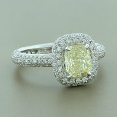 Fancy Yellow Diamond White Diamond Gold Halo Engagement Ring