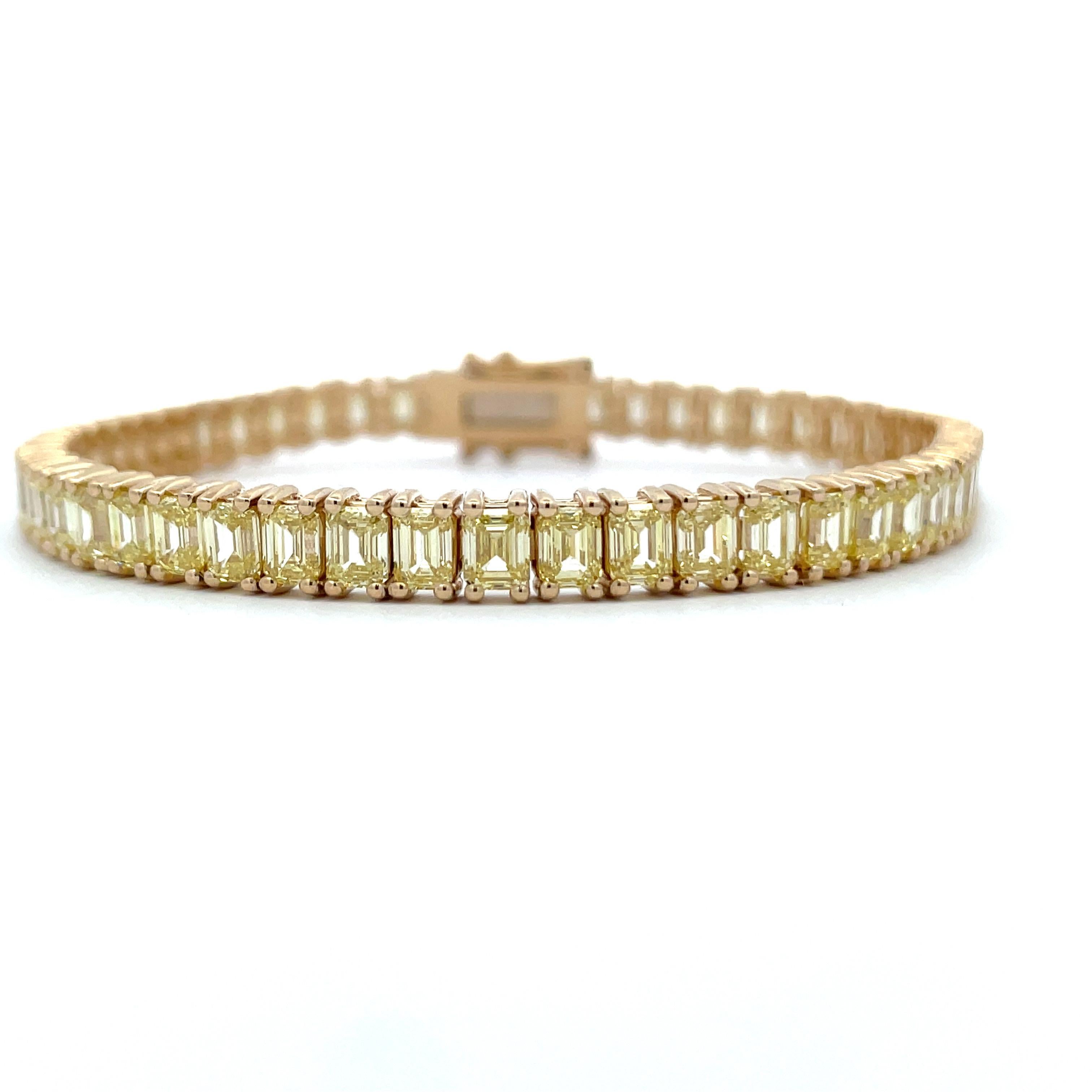14 Karat yellow gold tennis bracelet featuring 55 Fancy Yellow Emerald Cut Diamonds weighing 12.55 Carats. Clarity VS2
Available in white diamonds.