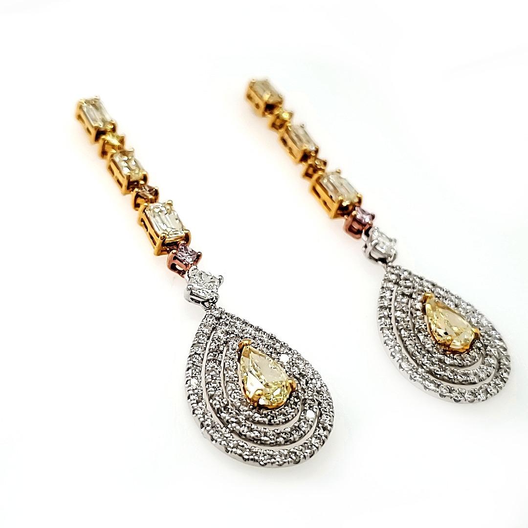 Fancy Yellow GIA certified long earrings

Delicately designed and painstakingly put together, these long earrings are a statement on their own.

The main stones are the pair of GIA certified Fancy Yellow diamond Pears of total weight cts 1.46 at the