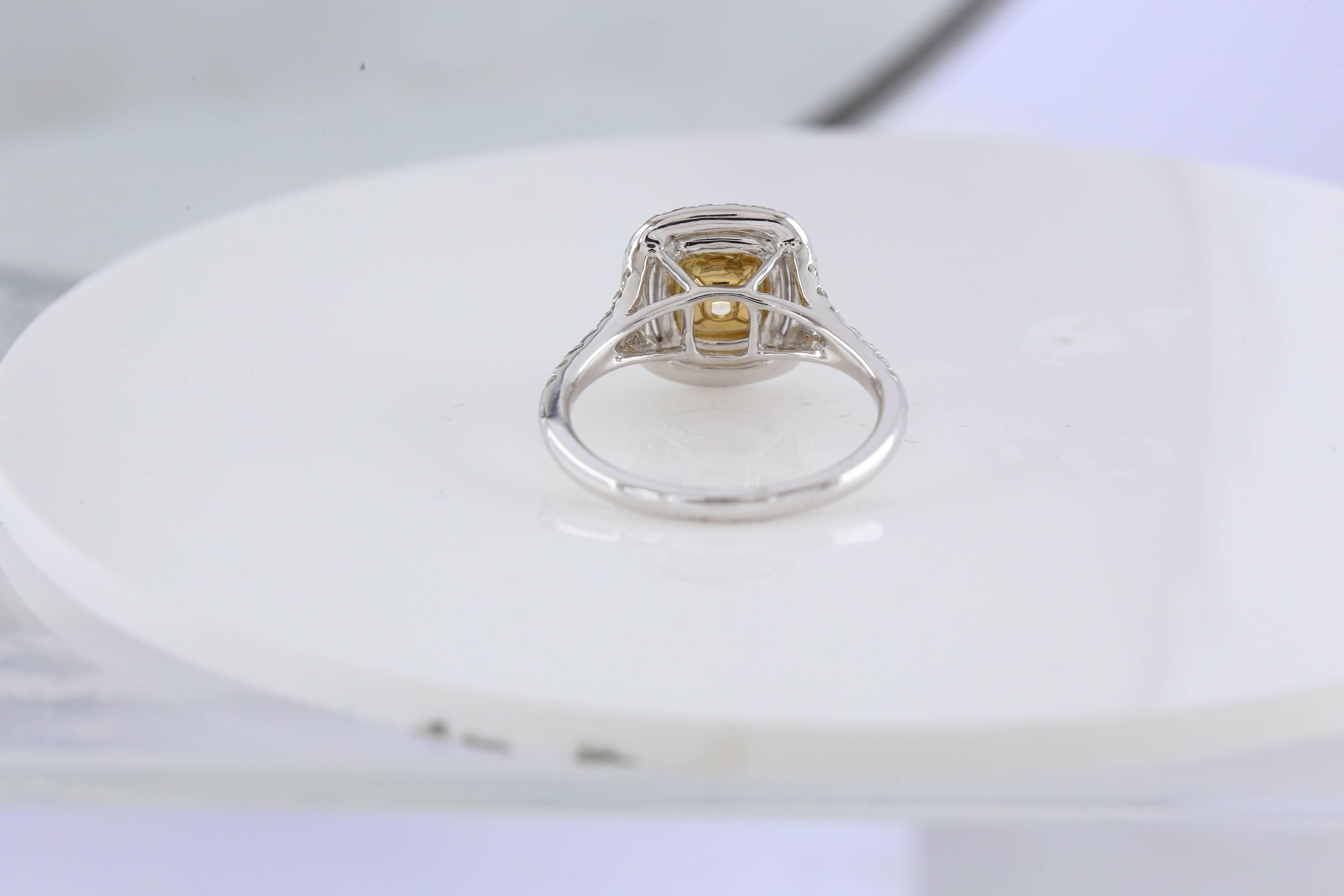 Modern Fancy Yellow HRD Certificated 0.96 Carat Diamond Ring For Sale