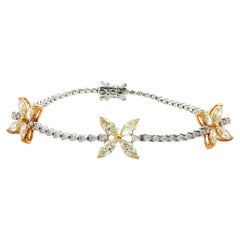 Ausgefallenes Tennisarmband mit gelbem Marquise und weißem Diamant mit Victoria-Motiv, 18 Karat Gold