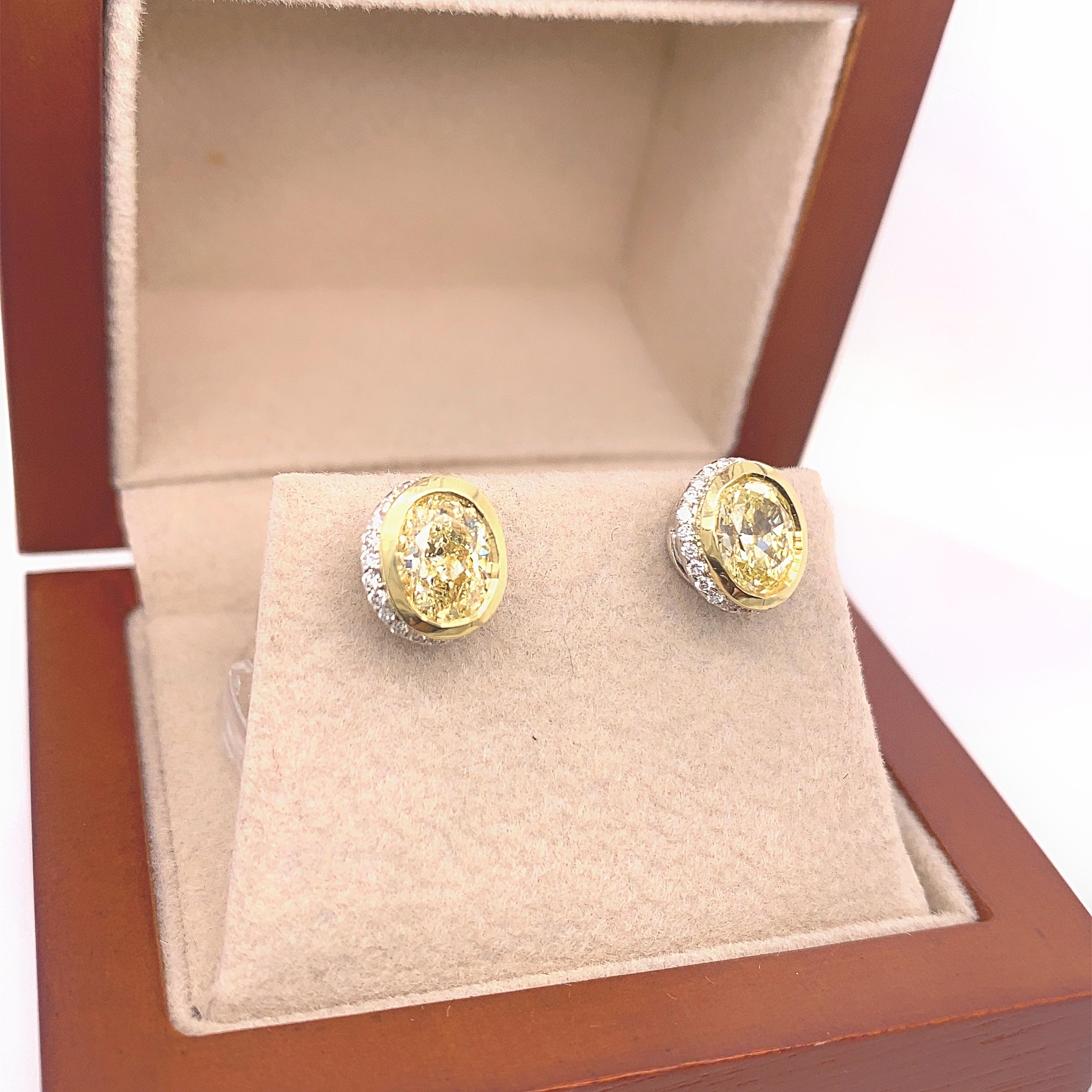 Fancy Yellow Oval Diamond 2.25 tcw Earrings Bezel Set in 18kt Yellow Gold Plat For Sale 5
