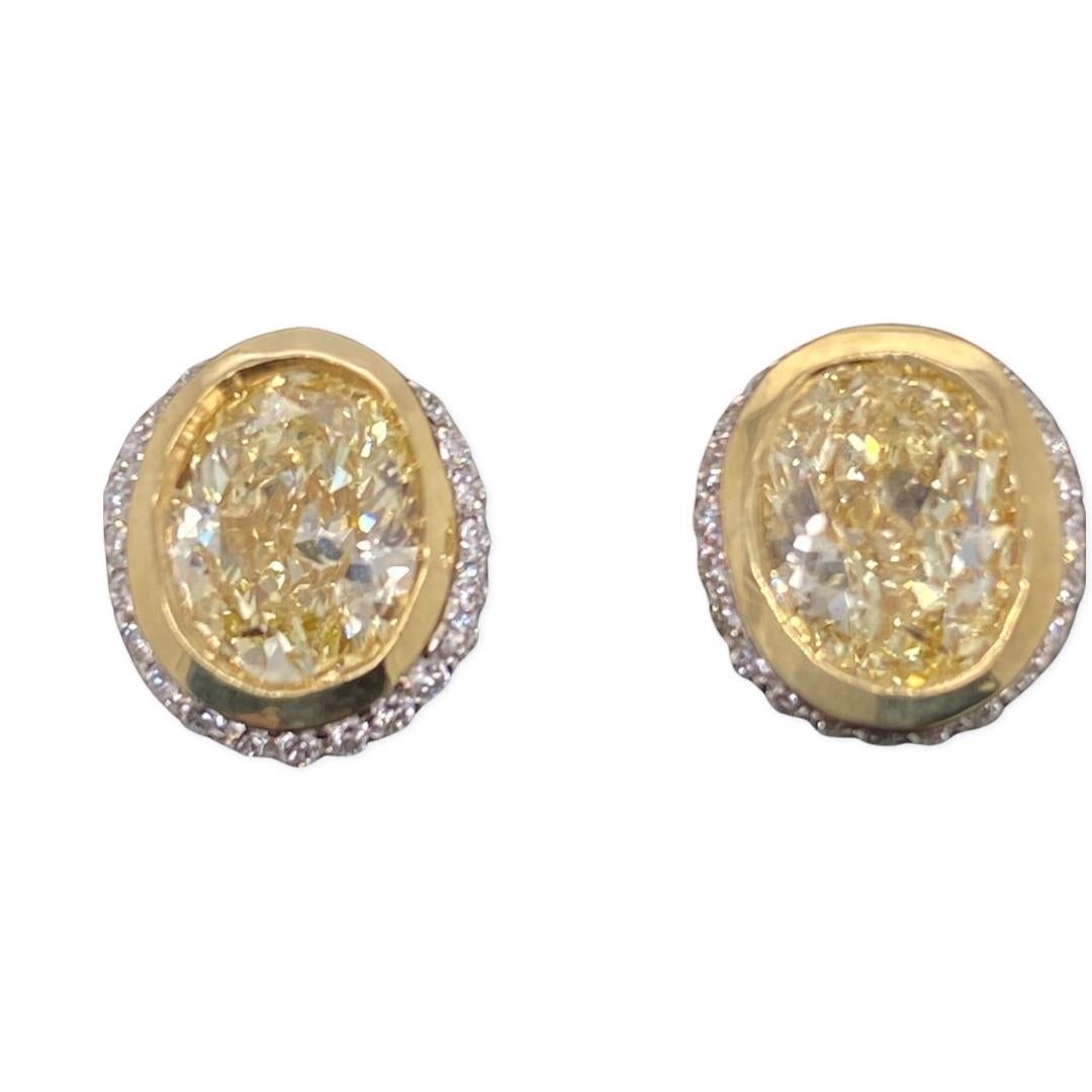 Fancy Yellow Oval Diamond 2.25 tcw Earrings Bezel Set in 18kt Yellow Gold Plat For Sale 7