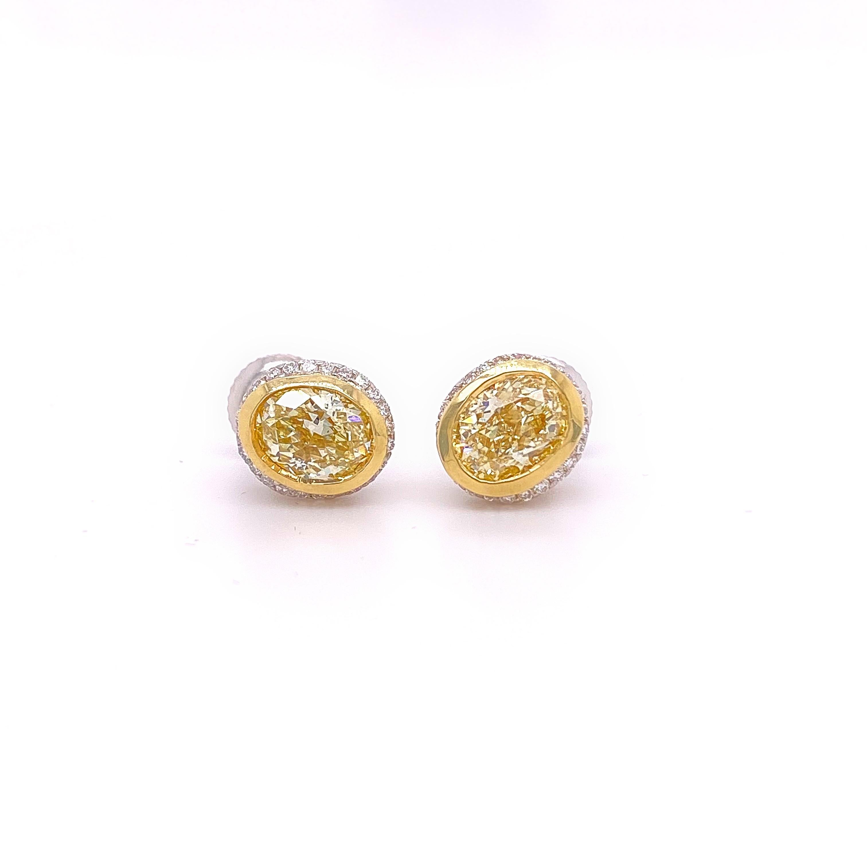 Women's or Men's Fancy Yellow Oval Diamond 2.25 tcw Earrings Bezel Set in 18kt Yellow Gold Plat For Sale
