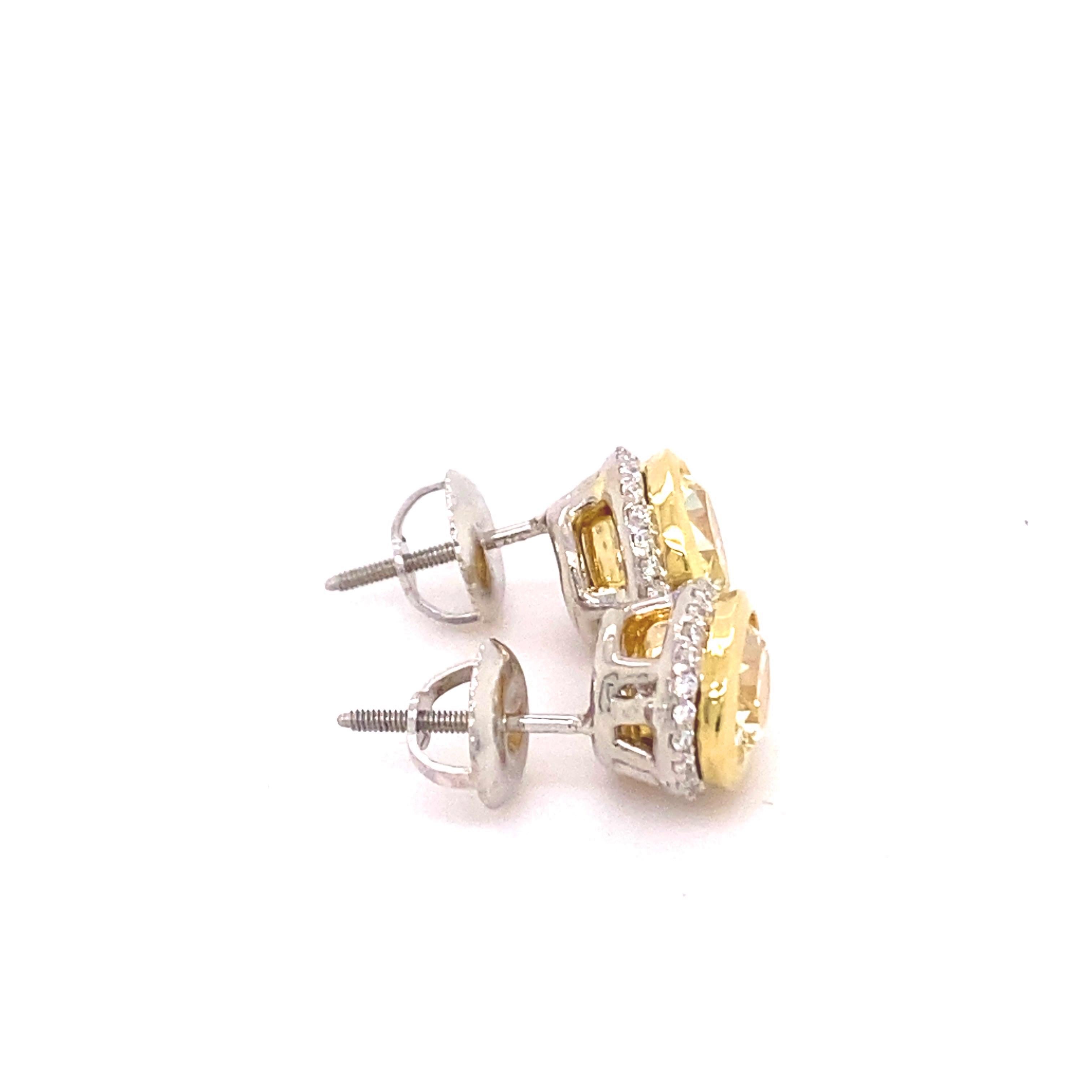 Fancy Yellow Oval Diamond 2.25 tcw Earrings Bezel Set in 18kt Yellow Gold Plat For Sale 2