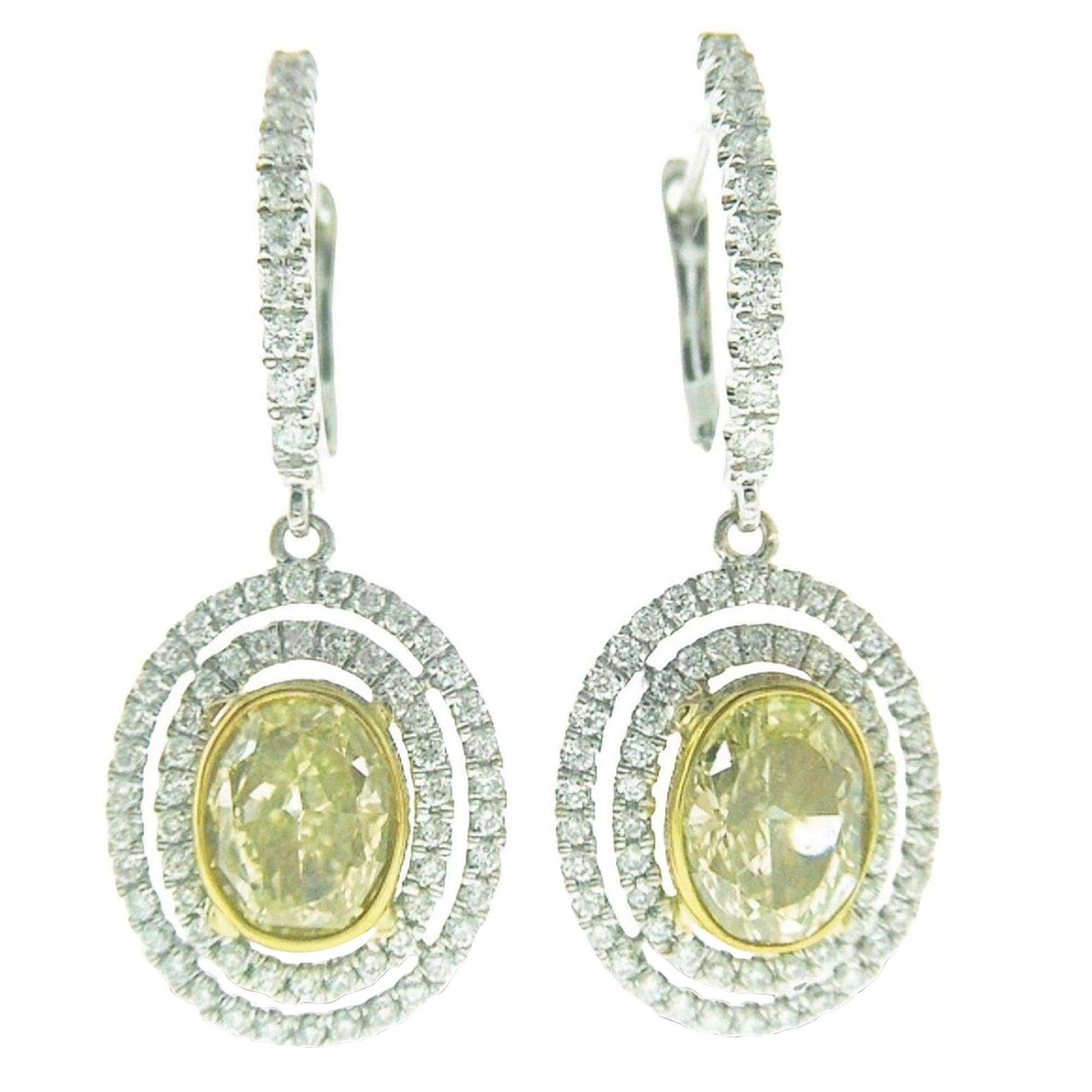 Orecchini pendenti a doppio cerchio con diamanti ovali gialli Fancy Yellow