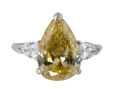 Fancy Yellow Pear Diamond Three-Stone Ring with Pear Diamond Accents