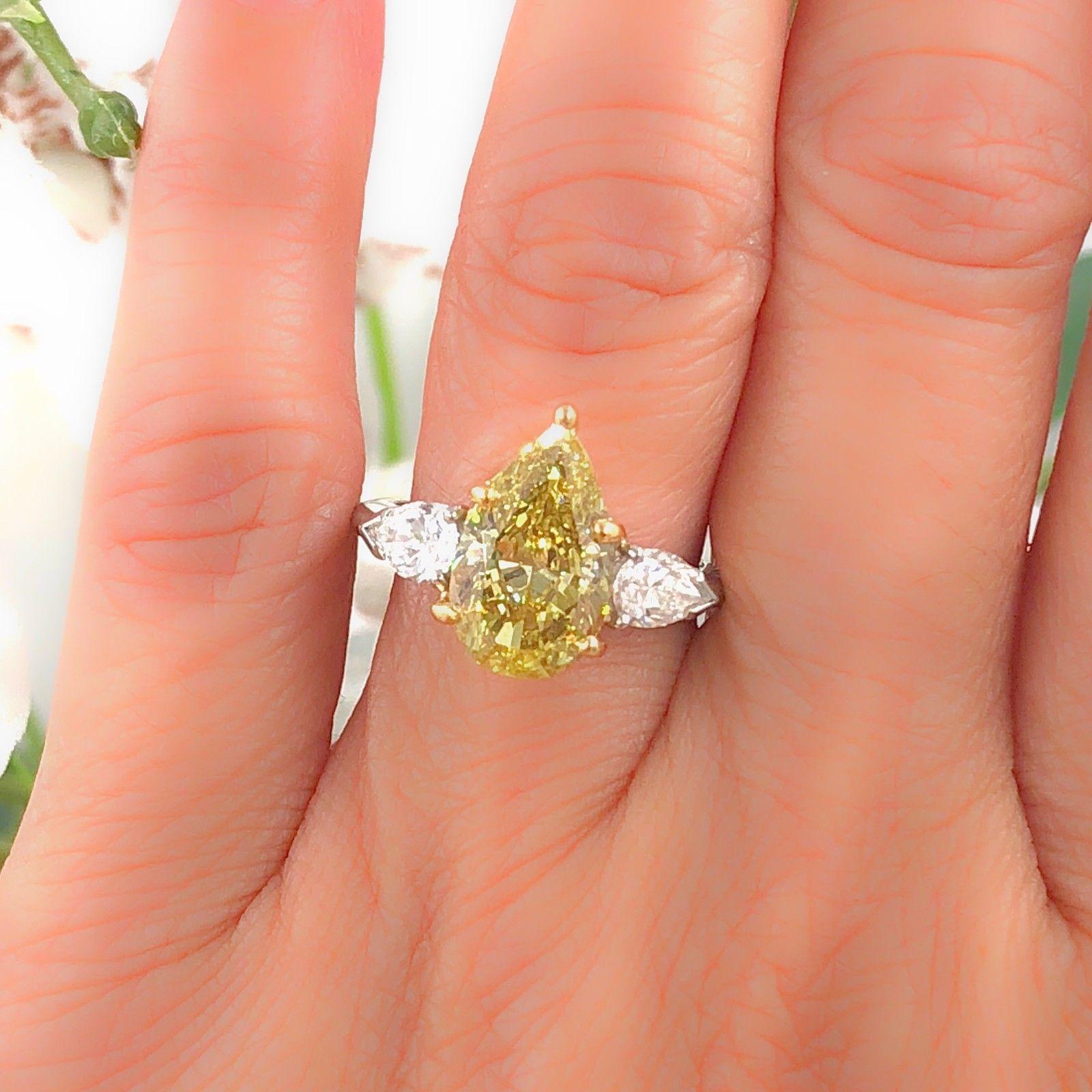 Fancy Yellow Pear Shape Three Stone 3.82TCW Diamond Engagement Ring in 18k GIA 6