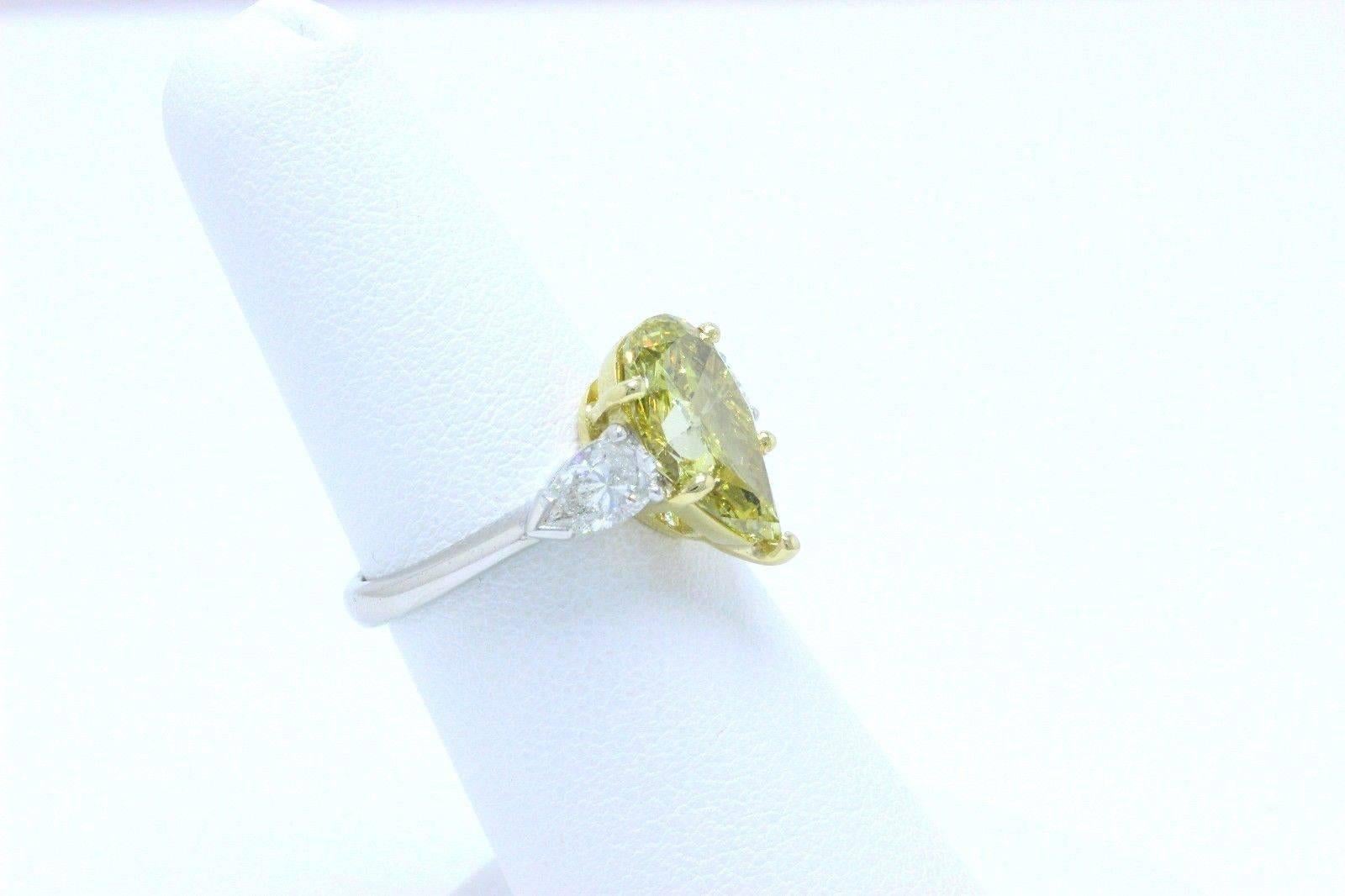 Pear Cut Fancy Yellow Pear Shape Three Stone 3.82TCW Diamond Engagement Ring in 18k GIA