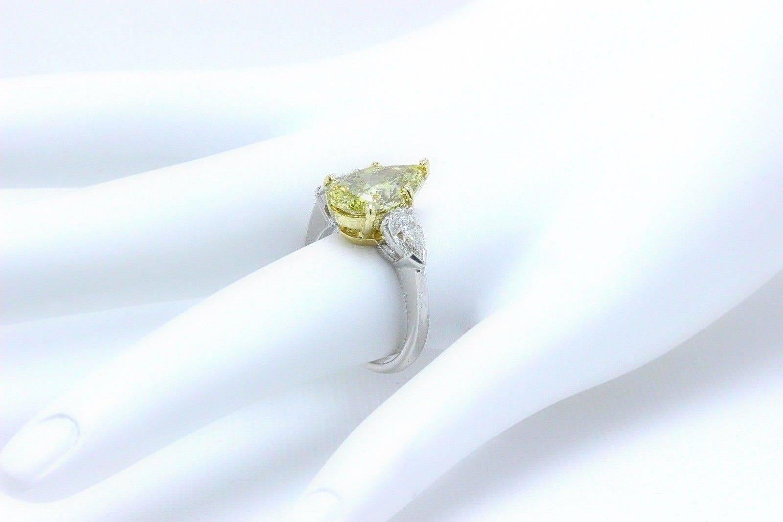Fancy Yellow Pear Shape Three Stone 3.82TCW Diamond Engagement Ring in 18k GIA 1