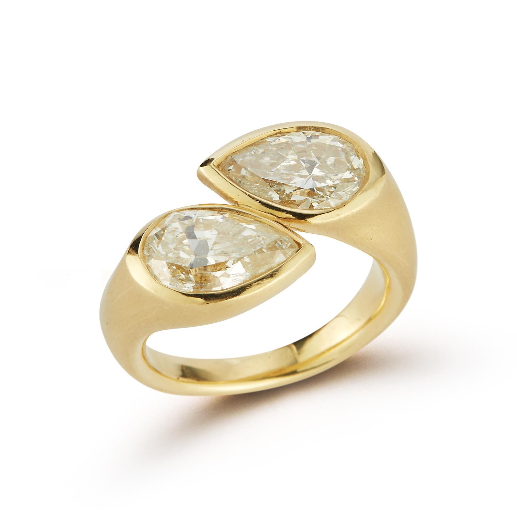 Fancy Yellow Pear Shaper Two Stone Diamond Ring GIA Certified, set in 18K Yellow Gold with a matte finish
Diamond Weight: 5.34
Color: K &M
Ring Size: 9
Re-sizable free of charge 
