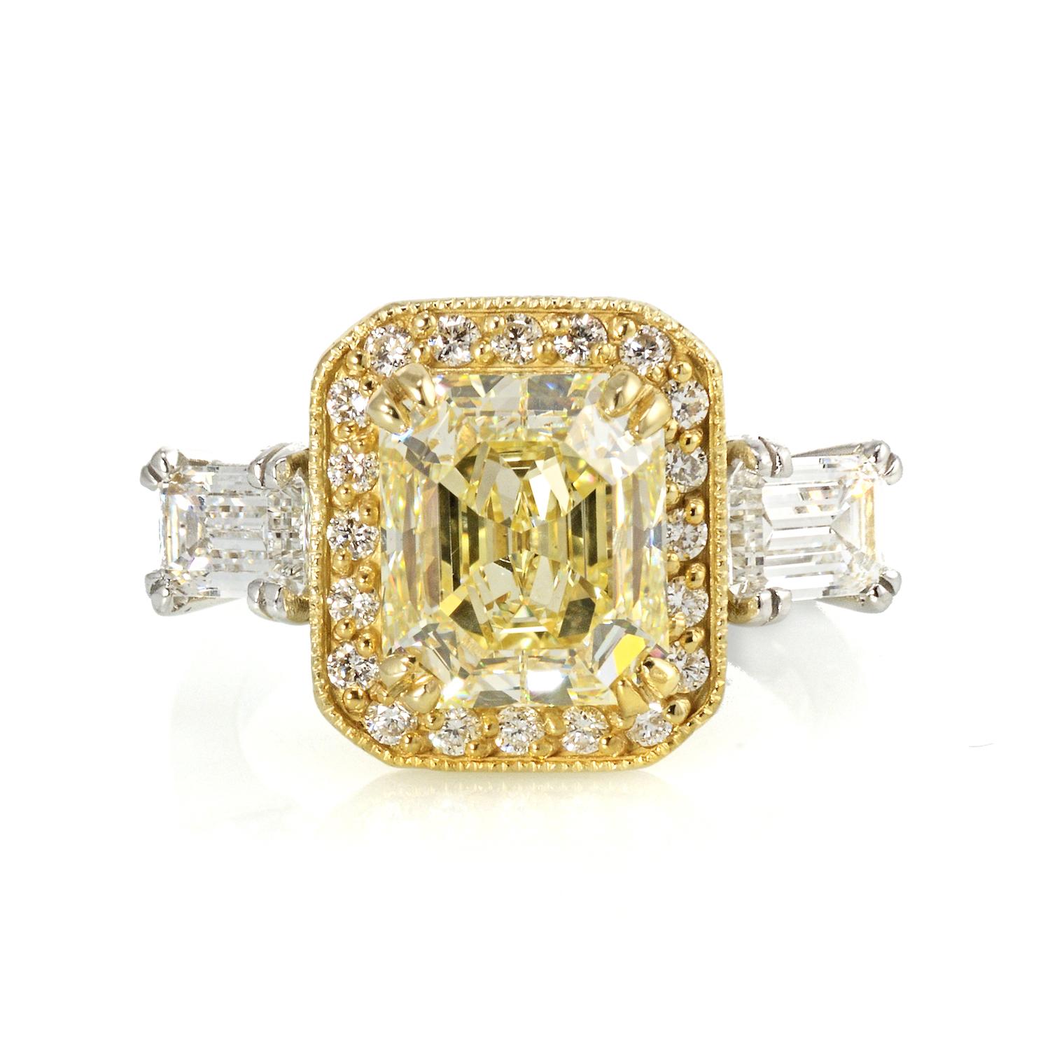 Fancy Yellow Radiant Cut Three-Stone Halo Set Diamond Engagement Ring In Excellent Condition In New York, NY