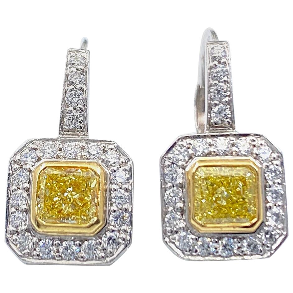 Fancy Yellow Radiant Diamond Bezel Set Halo Earrings 14 Karat White Yellow Gold