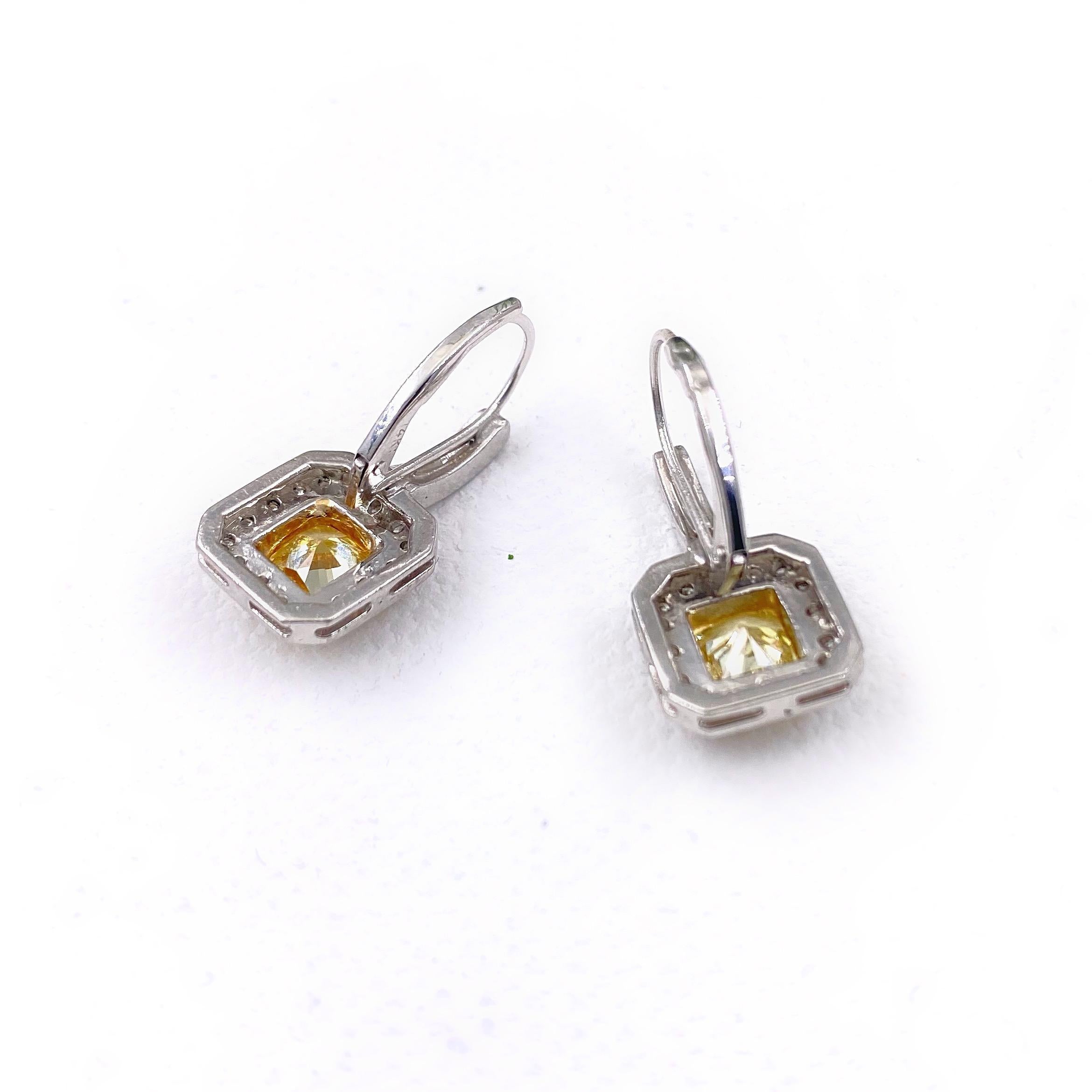 Fancy Yellow Radiant Diamond Bezel Set Halo Earrings 14 Karat White Yellow Gold 14