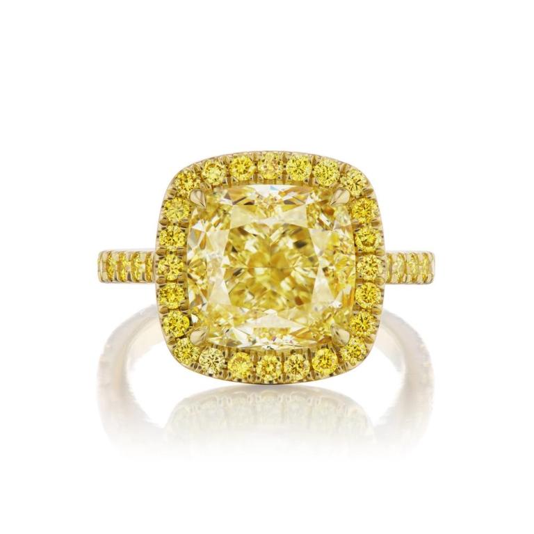 FANCY YELLOW RADIANT DIAMOND RING A brilliant GIA certified natural fancy yellow cushion cut diamond is surrounded by a romantic halo of natural fancy intense yellows on a pave band set in 18K yellow gold Item: # 03845 Metal: 18k Y Lab: Gia Diamond