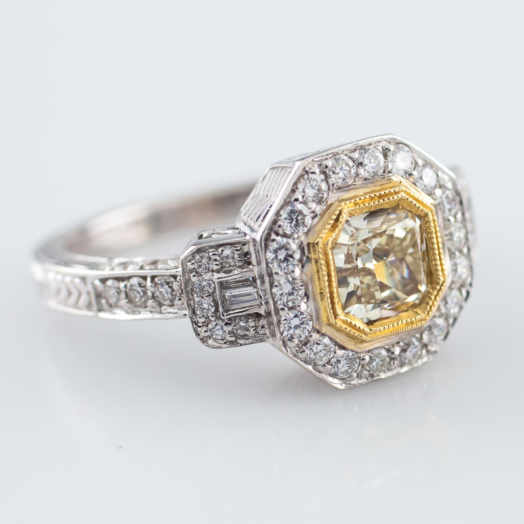 Gorgeous 18k gold ring featuring fancy yellow radiant solitaire (0.92 ct, VS2 clarity), and round and baguette accent diamonds (0.60 ct, G - H color, VS1 - VS2 clarity)
Ring Size: 6.5
Total Mass = 6.6 grams
Includes EGL Colored Diamond Analysis