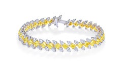 Fancy Yellow Radiant and White Pear Tennis Bracelet, 10.768 Carat