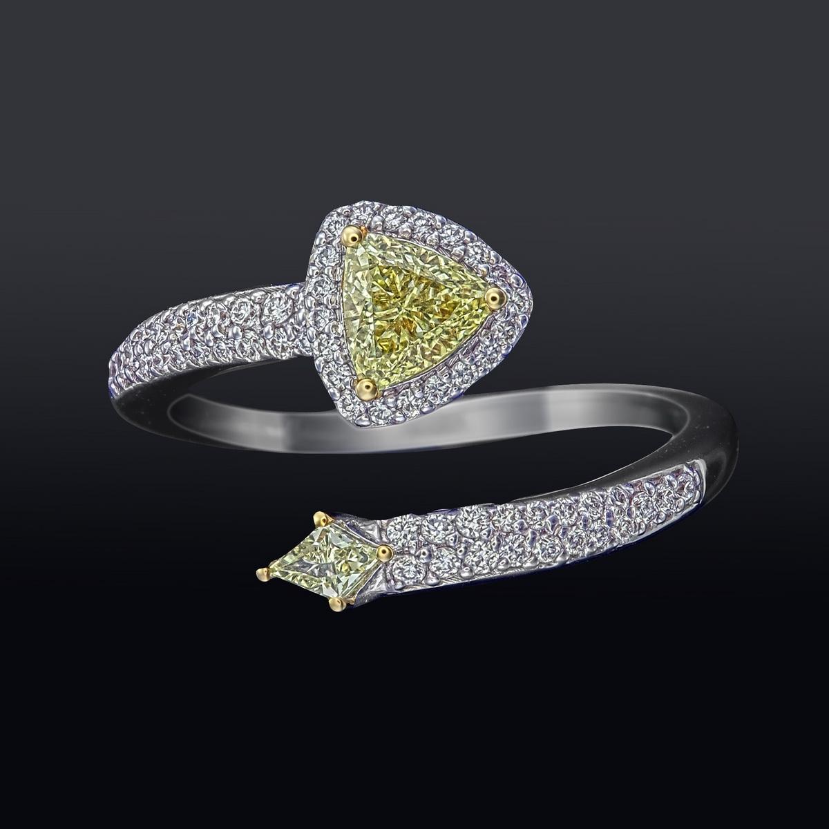 18kt white gold ring with diamonds
  
  Gold colour & karat: White gold 18kt
  Weight: 3.530 grams
  
  Set with-
  Stone type: Diamond 
  Shape: Trilliant
  Carat: 0.03 
  Colour: Fancy Yellow
  Clarity: VVS-VS
  
  Surrounding Stones: Diamonds
 1)