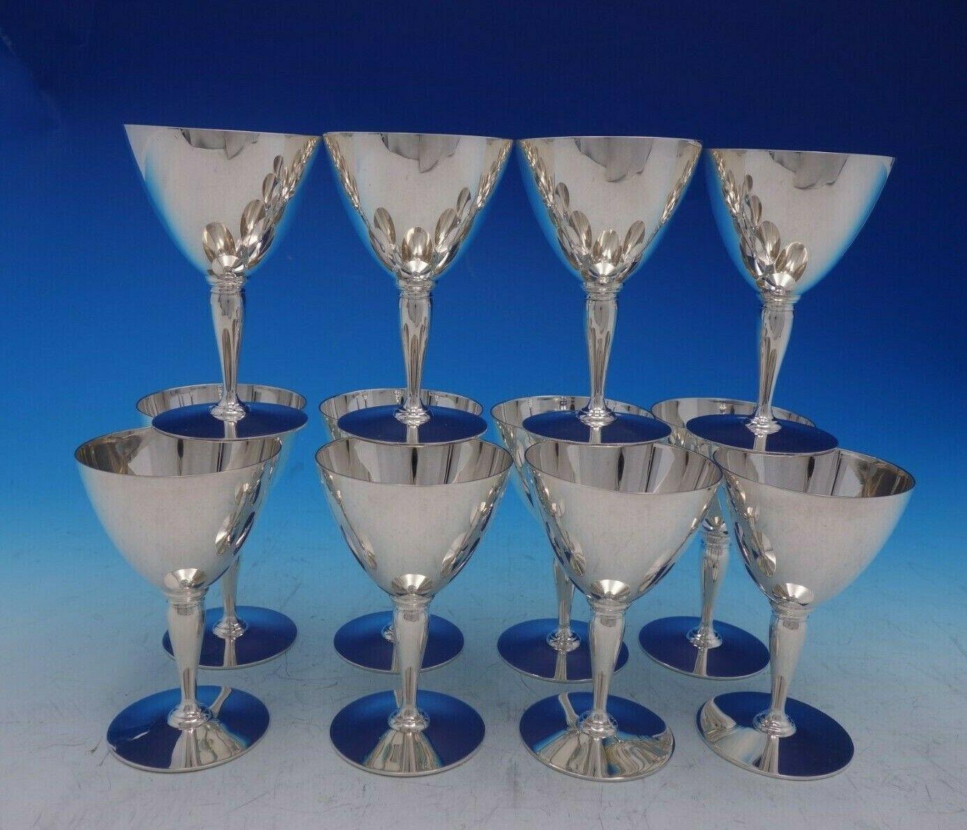 Faneuil by Tiffany and Co

Beautiful Faneuil by Tiffany and Co. sterling silver 12-piece after-dinner wine glass set marked #18885-7895. The pieces each measure 4