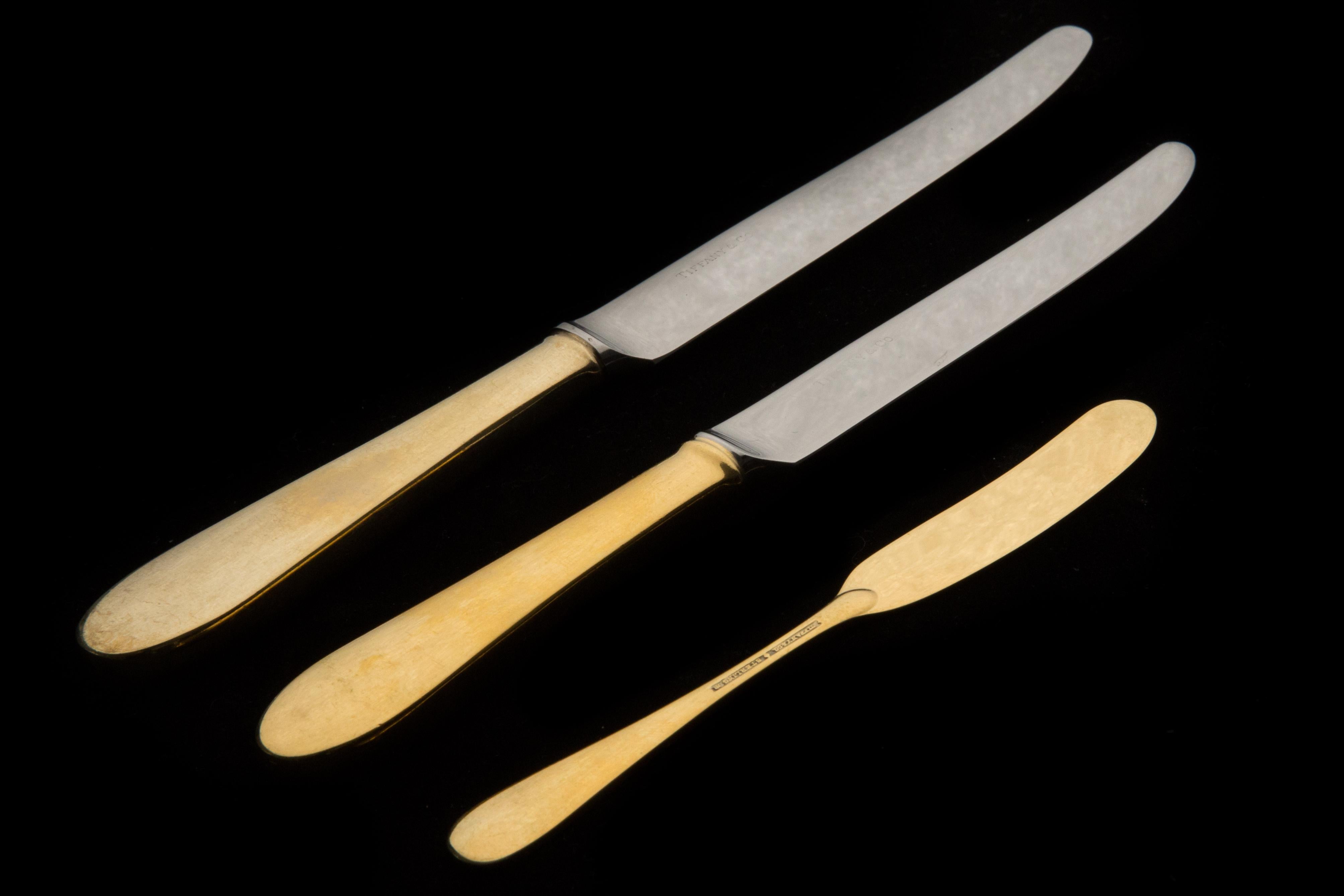 Faneuil Gold by Tiffany and Co. sterling silver flatware set, over pieces. Gold flatware is on trend and makes a bold statement on your table. This set is vermeil (completely gold-washed) and includes: 12 dinner forks, 11 lunch forks, 12 cake forks,