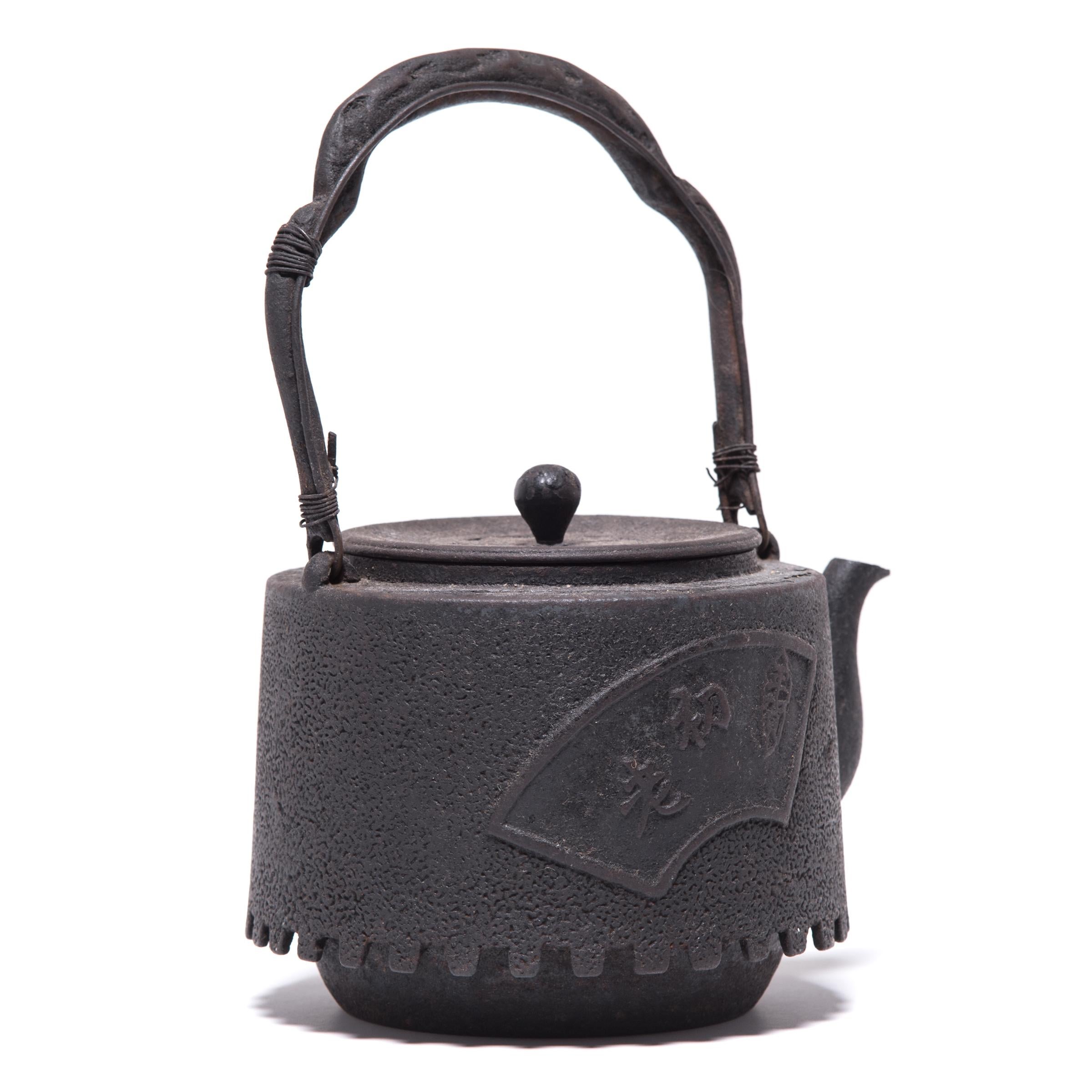 Decorated with a raised fan motif, this aptly named teapot was used to boil water for traditional tea ceremonies. Known as tetsubin, the kettle’s cast-iron construction is said to change the quality of the water, making tea taste mellow and sweet.