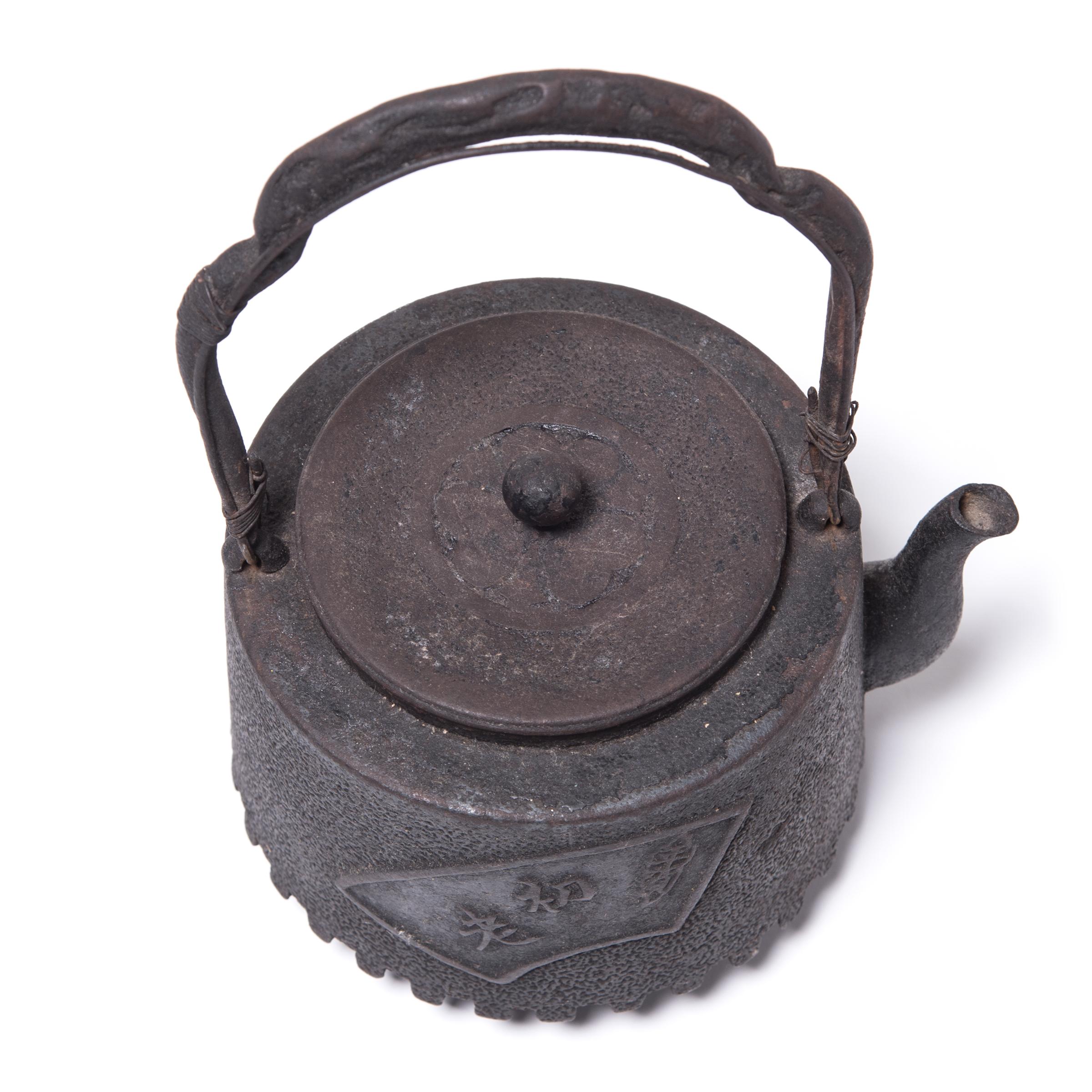 “Fanning the Fire” Japanese Tetsubin Kettle, c. 1924 In Good Condition For Sale In Chicago, IL
