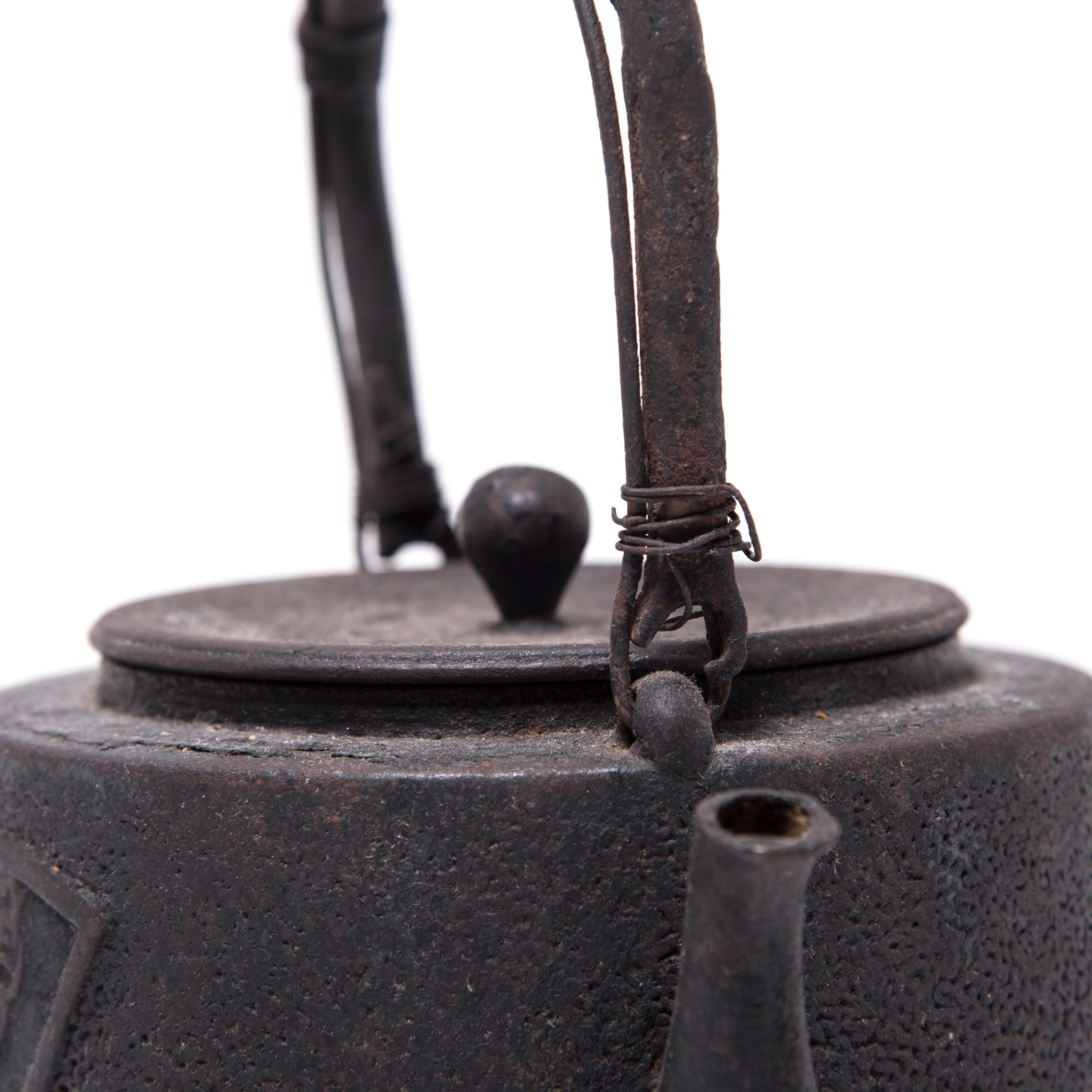 Iron “Fanning the Fire” Japanese Tetsubin Kettle, c. 1924 For Sale