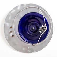 Nudo. Abstract Polished metal, metal knot, metal, and Glass. Wall sculpture