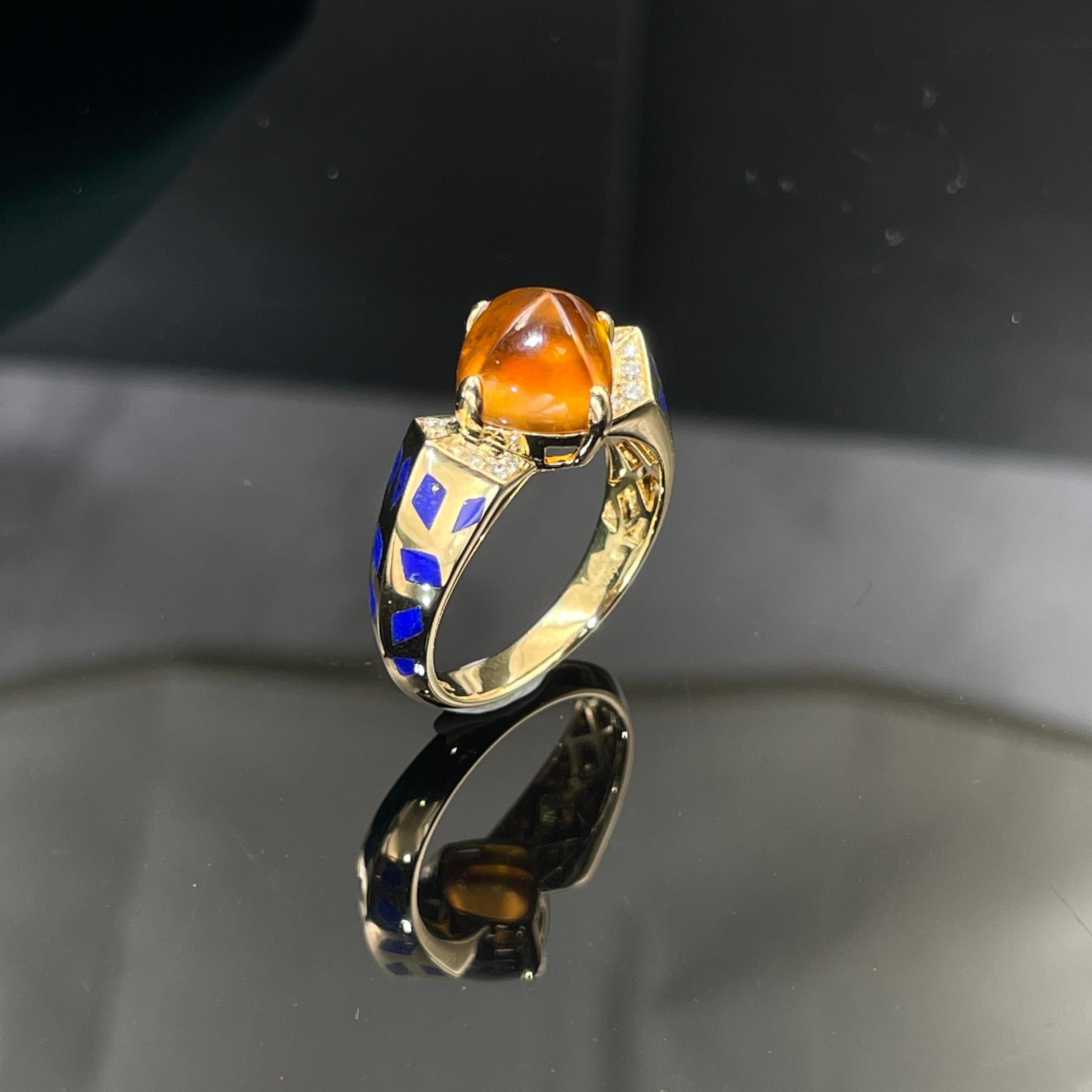 This is a sugarloaf ring inspired by Cartier sugarload collection. The Center stone is a Fanta Colour Spessartite Garnet sugarloaf secured by 4 18K Yellow Gold Claws. It is then descended into 2 geometric platform with diamond pave, followed by