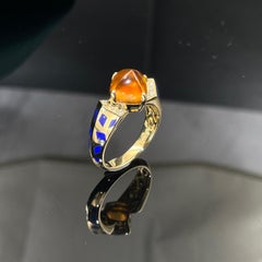 Eostre Ring aus 18 Karat Gold mit Fanta Spessartit Granat, Lapislazuli und Diamant