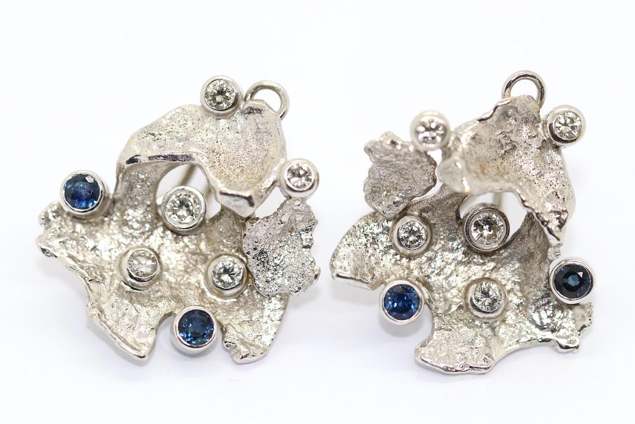 Beautiful and unique Fantasie Earrings Ear Clips 14 Karat White Gold with Diamonds and Sapphires.

Including certificate of authenticity.
