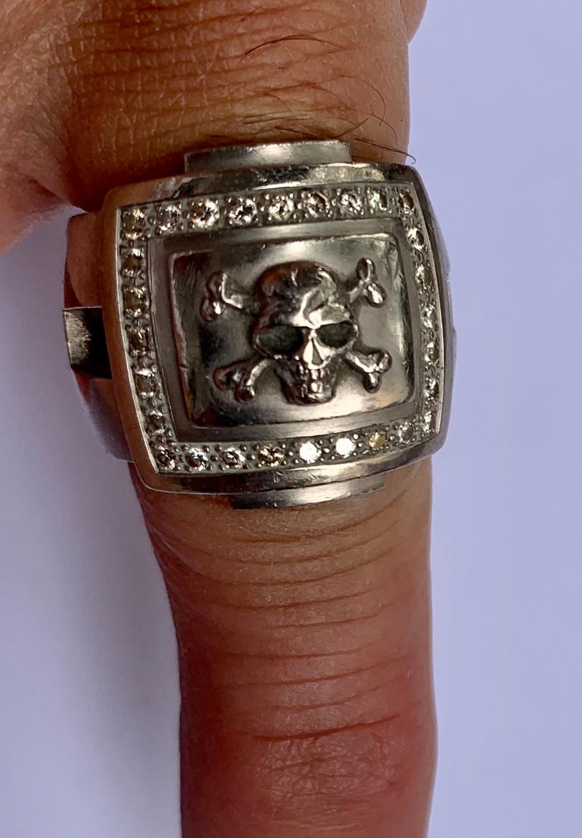 Skull ring in solid 18 K white Gold set with diamonds! This is a unique and bespoke creation by Christophe Graber Zurich, who is internationally known for his mythical creations and jewellery!
The ring is currently size 57/17 but can easily be