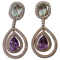 Fantastiques boucles d'oreilles en or rose 18 carats avec améthystes et diamants