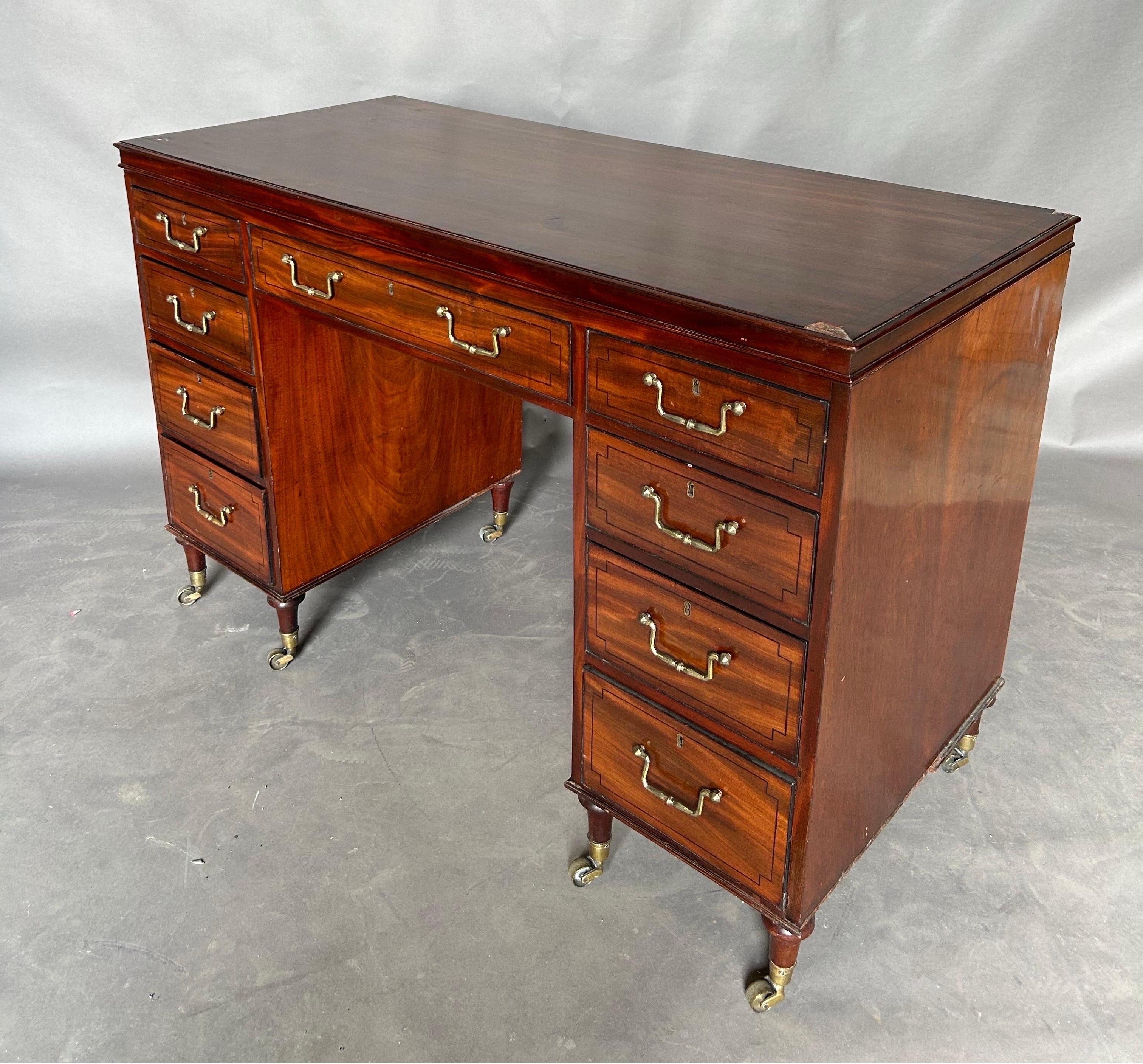 Fantastic early 19th century Regency period metamorphic dressing desk. The solid mahogany writing surface is actually a lift top that reveals an adjustable mirror. A very elegant piece from one of the most ambitious periods of furniture making. 