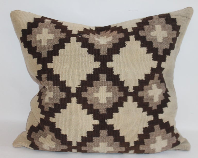 Early 19th century Navajo Indian weaving pillows in very good condition. Selling as a pair but different sizes.

Measures: 25 x 28 smaller pillow

26 x 22 larger pillow.