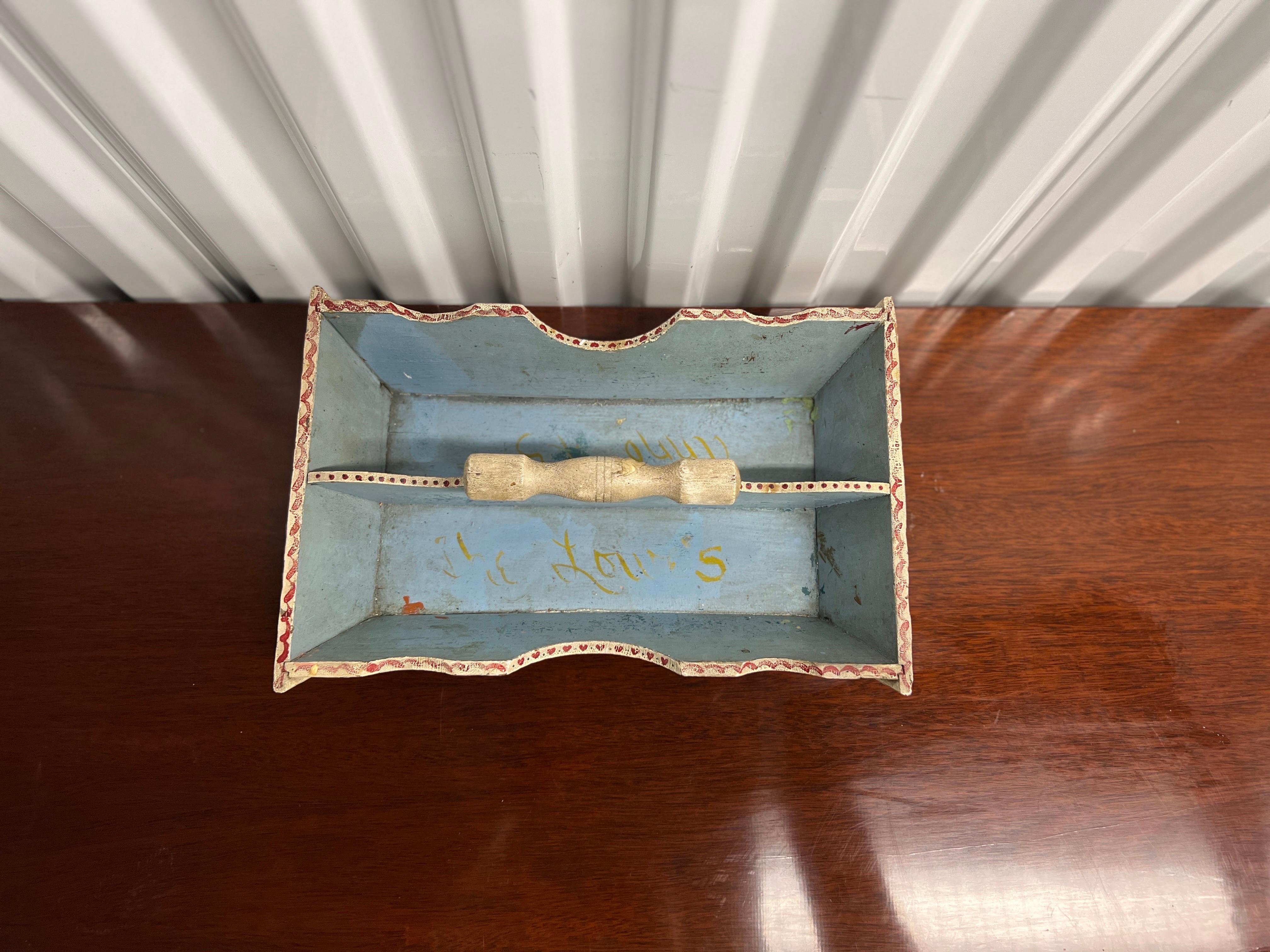 American, circa 1845.

One of the finest quality folk art cutlery trays on the market. Not only does this piece have its original robin's egg blue paint to interior and underside, but it also has a heart and geometric design across the body. 

The