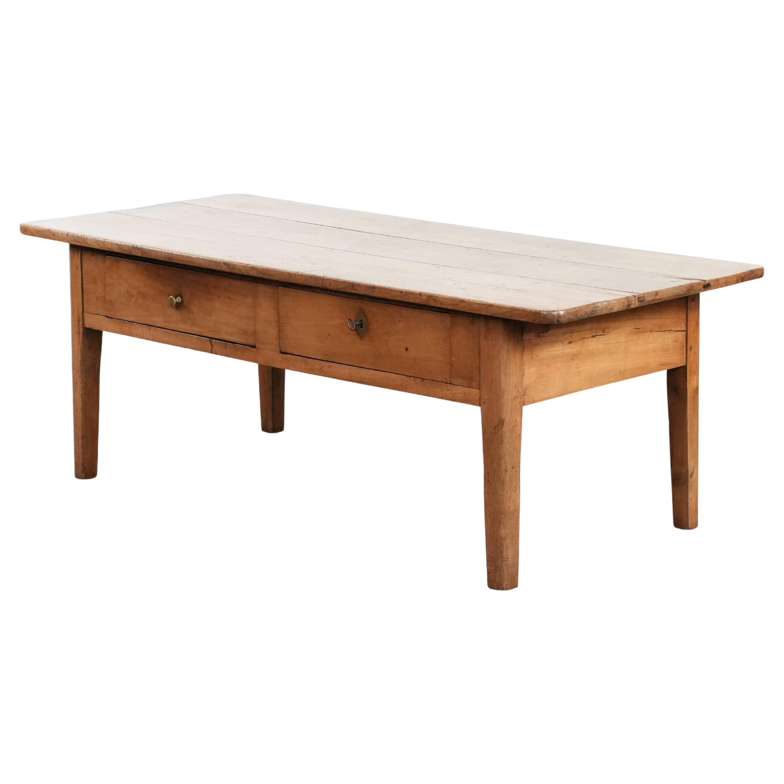 Fantastic antique French coffee table made of fruitwood with two drawers For Sale