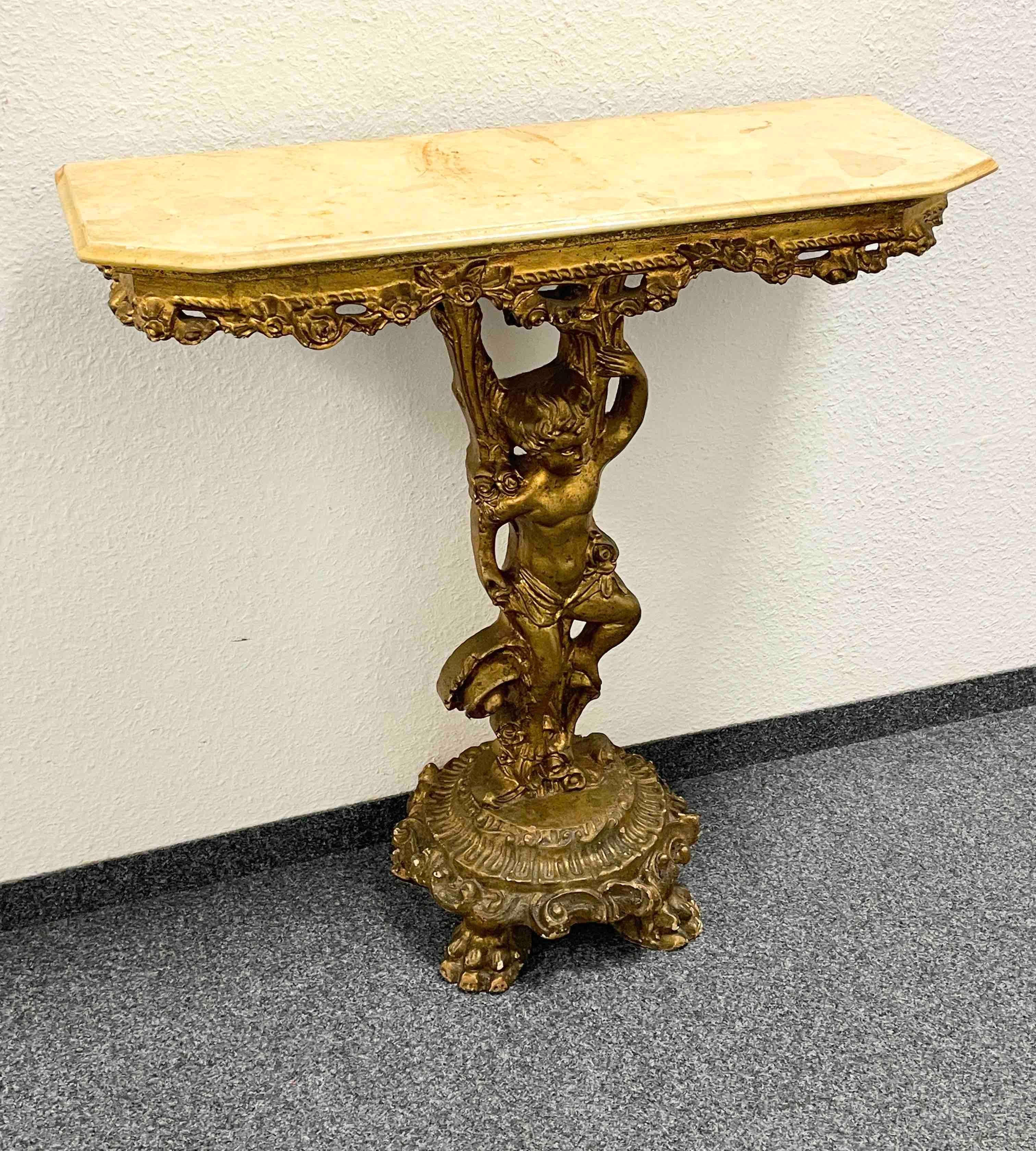 Beautiful Florentine Italian painted console table with marble top. Perfect as side table, next to a reading chair or used a small vanity table. It could also be great at the end of a narrow hallway with a mirror or artwork hung above it. The piece