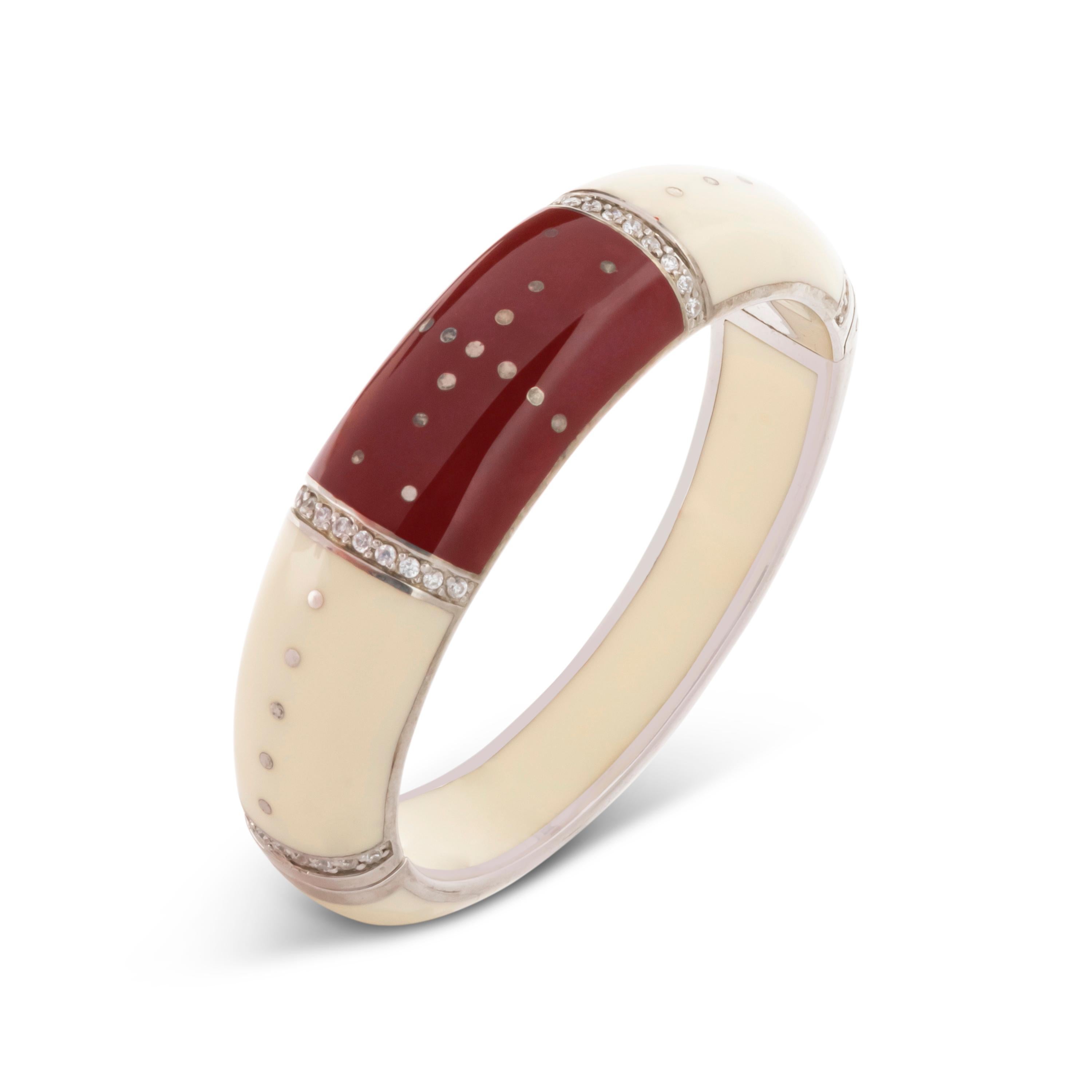 Fantastic Art Deco - Miriam Salat (MIRIM) bangle features cream / Ivory and wine bottle color resin with sterling silver
Brilliant cut full facet white topaz, prong set by hand. 
Bangle has a magnetic closure; measures apx. 6-1/2 inches in