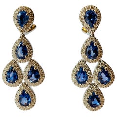 Fantastiques boucles d'oreilles pendantes chandelier en saphirs bleus et diamants