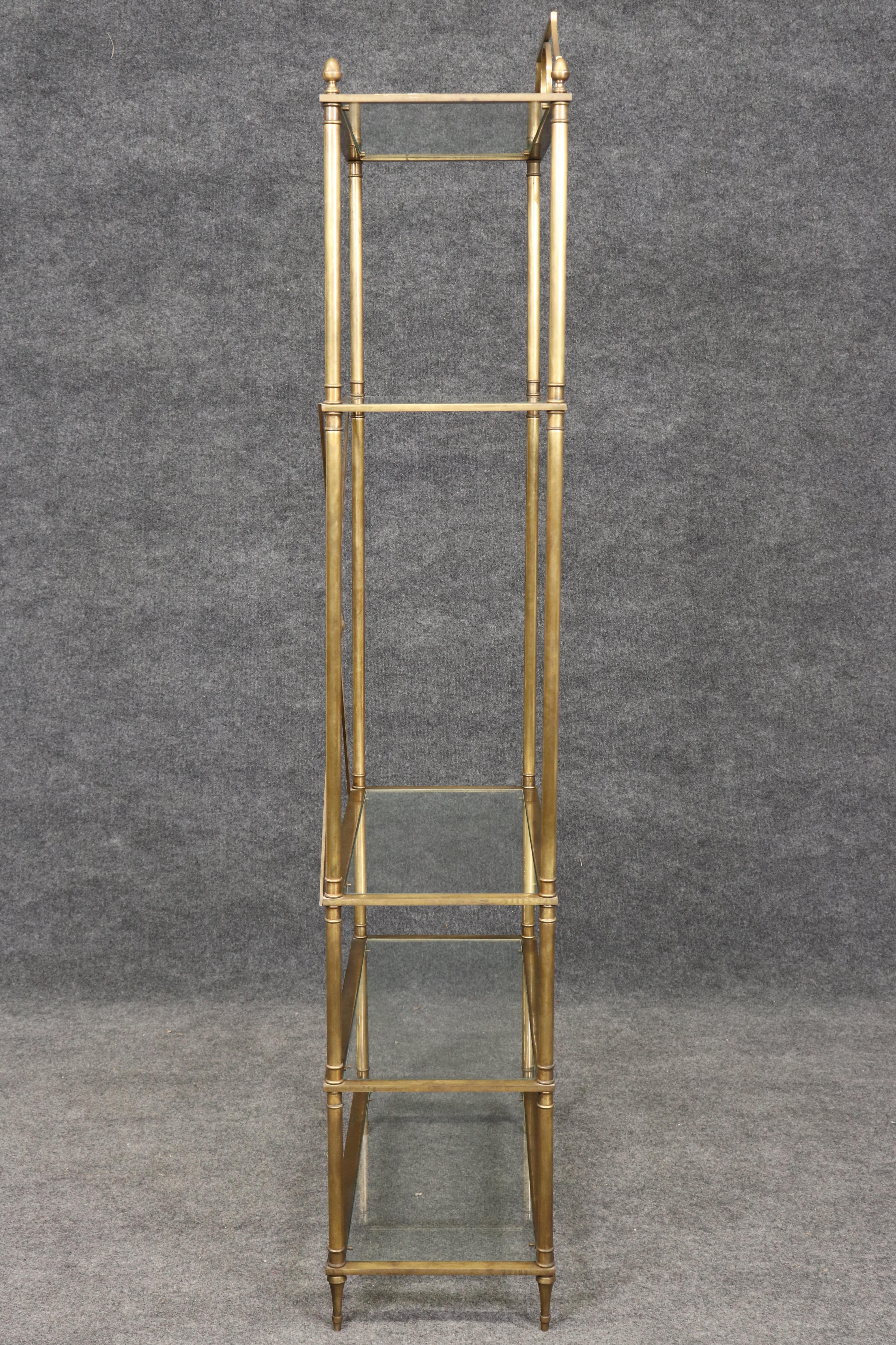 Direttorio Fantastico espositore a scaffale a 5 livelli in bronzo o in ottone della Maison Jansen in vendita