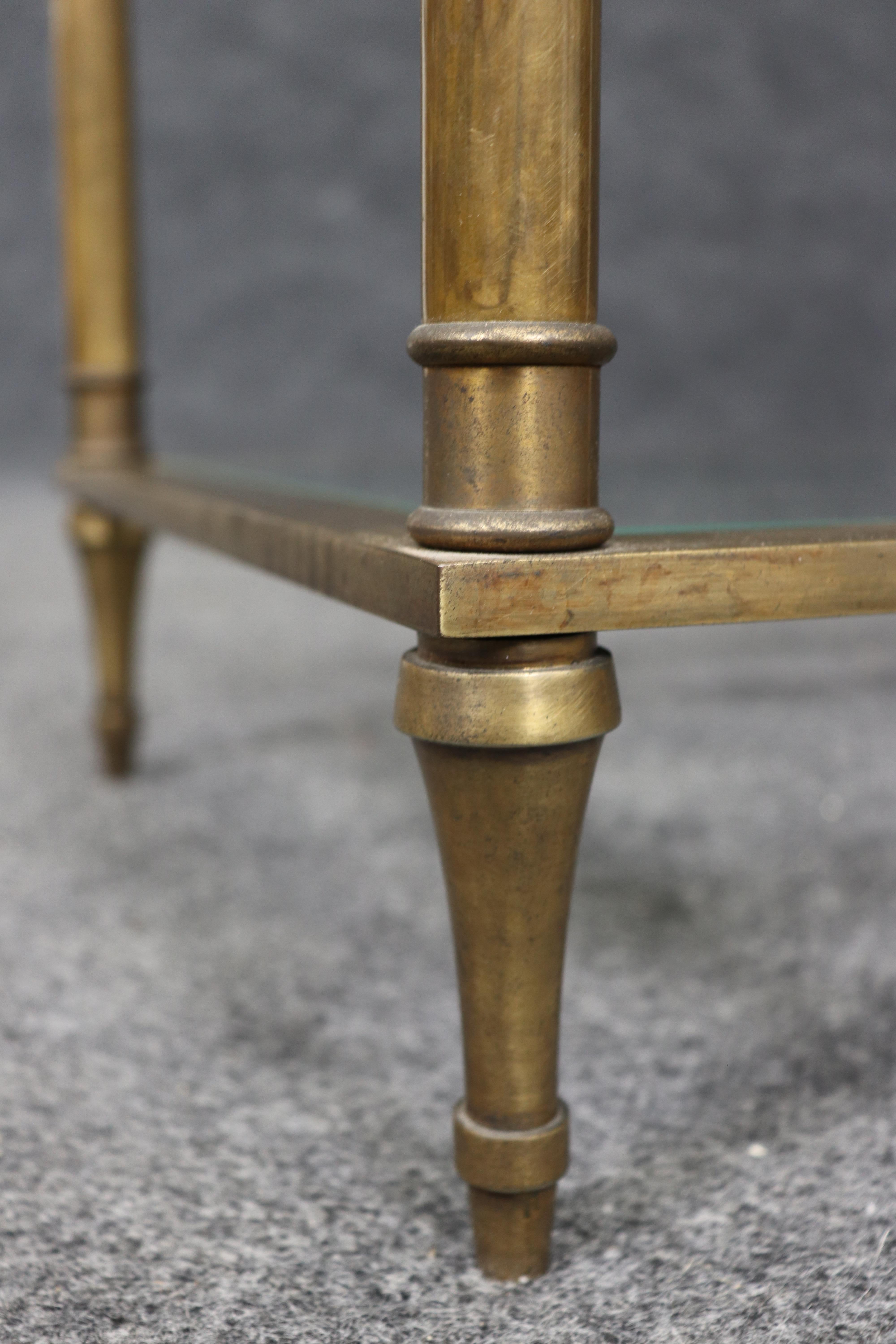 Fine XX secolo Fantastico espositore a scaffale a 5 livelli in bronzo o in ottone della Maison Jansen in vendita